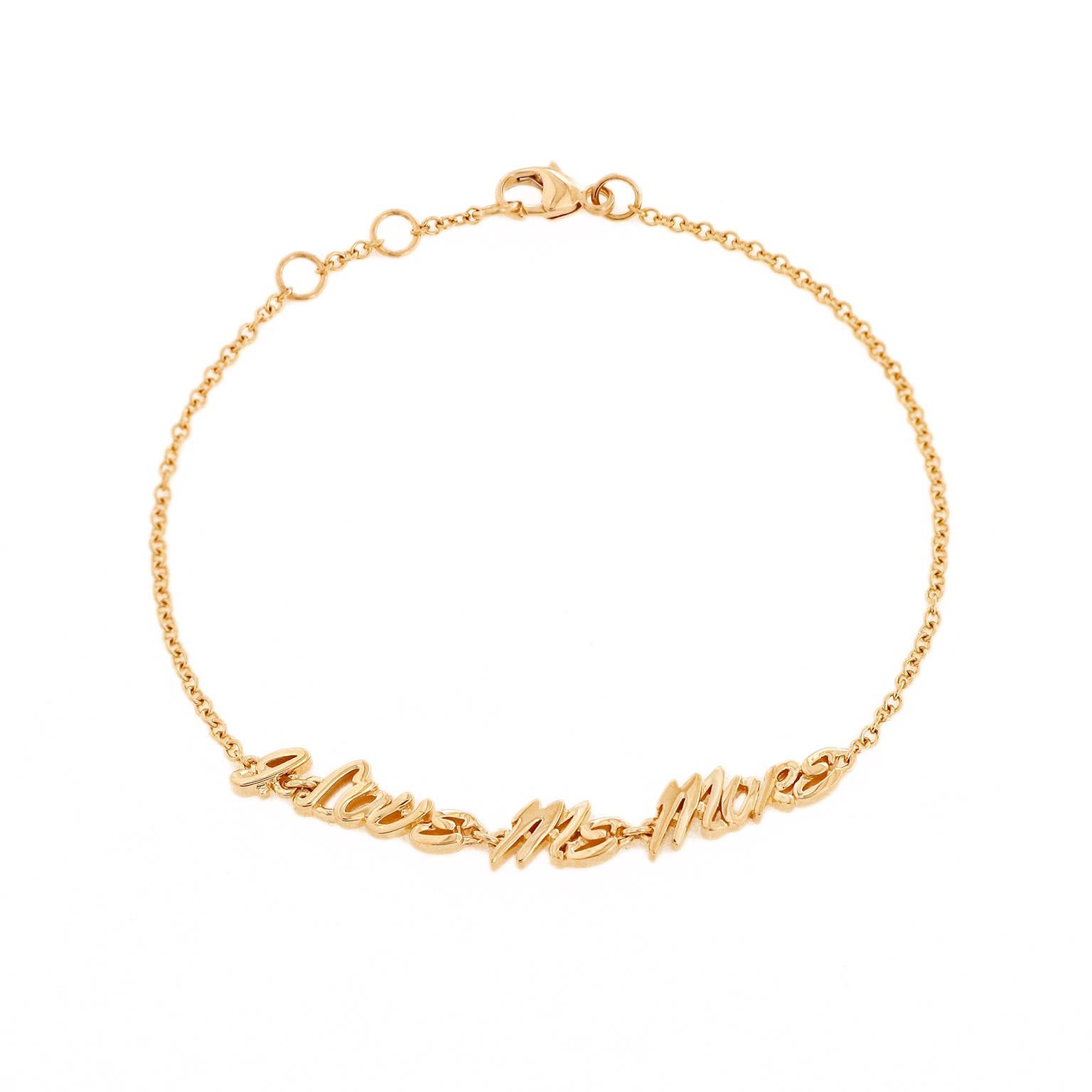 A personal confirmation is the centerpiece of this bracelet. A blend of gold and copper creates 18k pink gold, which forms the slim chain and curved lettering. The oath I Love Me More is in the middle of the bracelet. A lobster claw clasp with