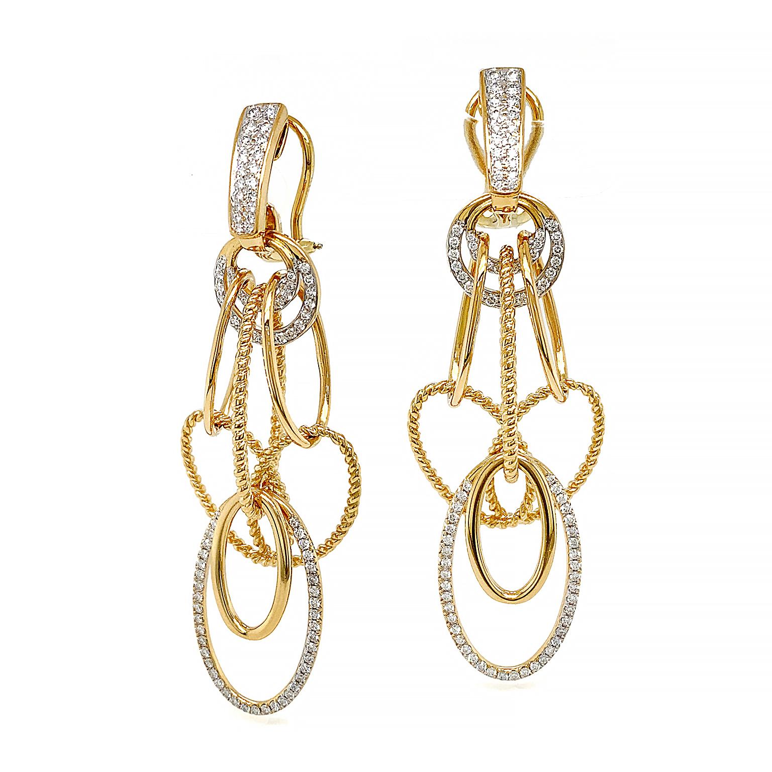 Layers of luminous 18k yellow gold ovals and brilliant cut diamonds form hoop earrings. A total of 190 brilliant cut diamonds embellish the design, weighing 1.49 carats, beginning with fully decorated lever backs. In this elegant interpretation of