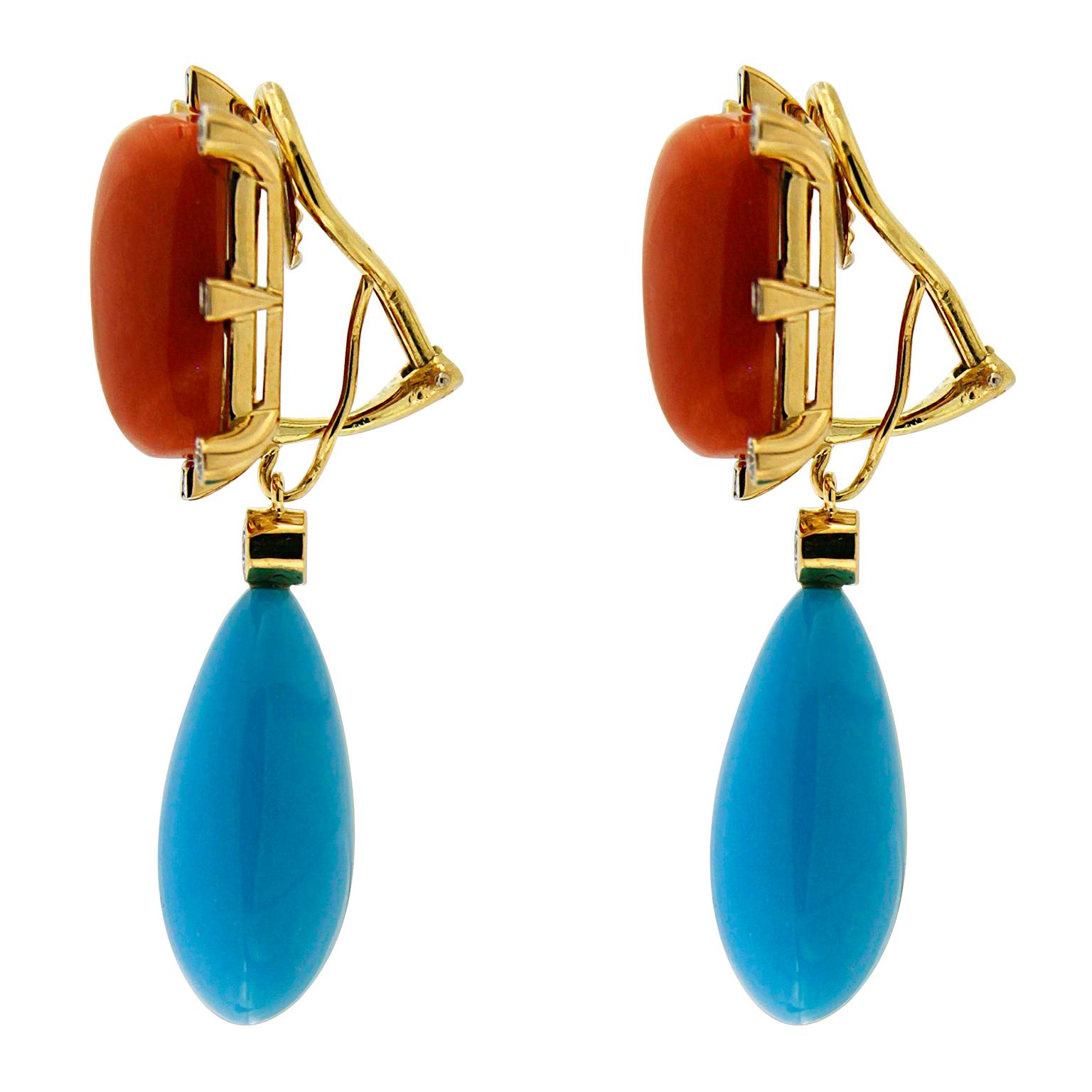 Valentin Magro Cushion Coral and Tear Drop Turquoise Earrings. Above is coral carved into rectangular cabochons. Round brilliant cut diamonds rest against its corners, and princess cut diamonds by its sides. A drop shaped turquoise with a round