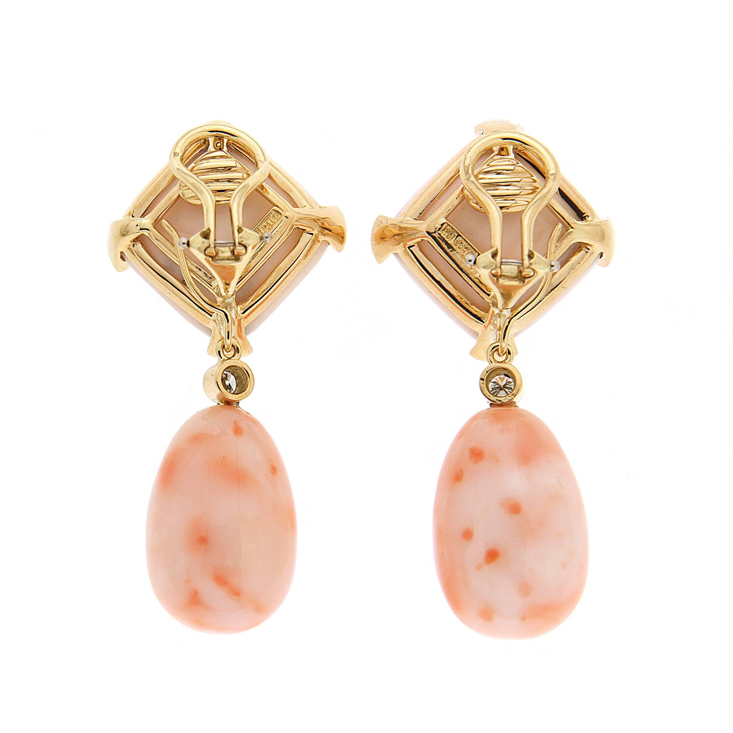 Valentin Magro Cushion Drop Coral Earrings boast pink on pink. The uppers are carved into cushion shaped cabochons and exhibit a pale blush. They’re set rhombus-like between four 18k yellow gold bands. Angel skin coral hanging underneath is shaped