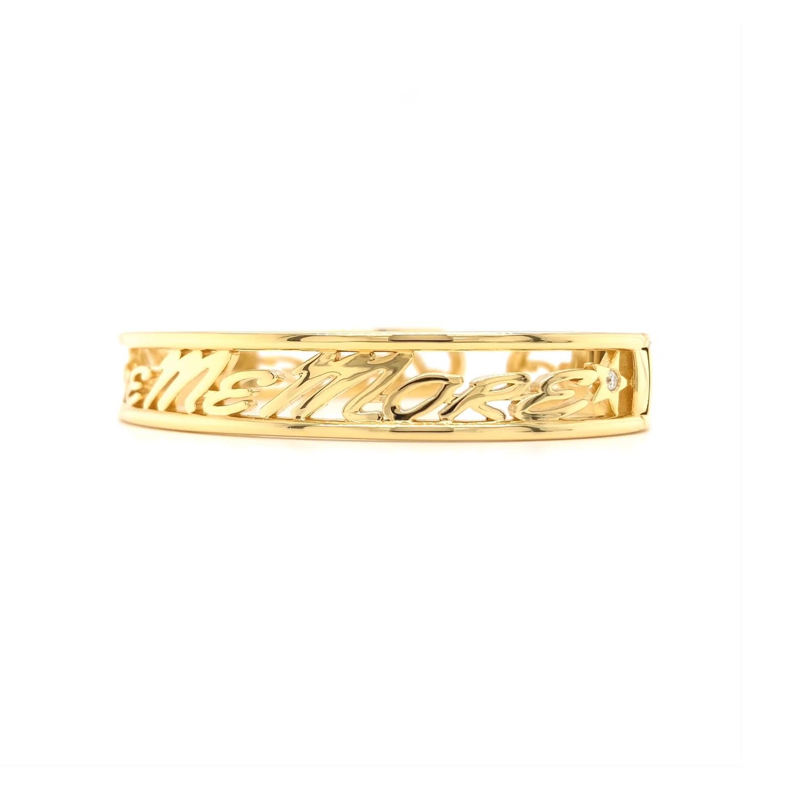 Love and stars embellish this bracelet. The body is 18k yellow gold, with smooth lines forming the edges. Inside, the phrase 'I love me more” serves as affirmation and adornment. Stars brightened with round brilliant cut diamonds punctuate the