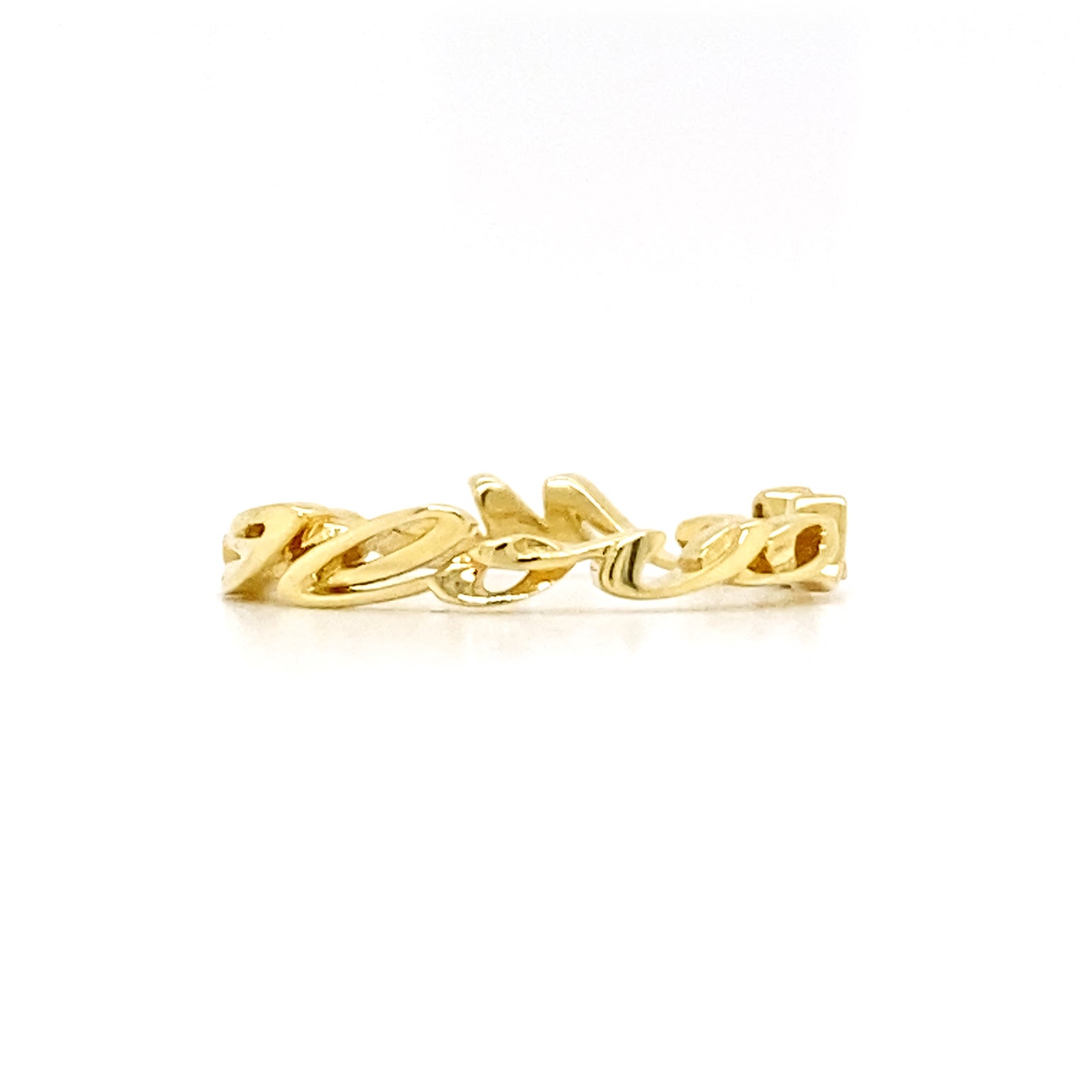 The dazzling 18k yellow gold script forms a personal message of assurance for this ring. Each letter is depicted with a dimension as it spells I Love Me More, encompassing the band. 18k yellow gold has a high caliber of malleability, which is