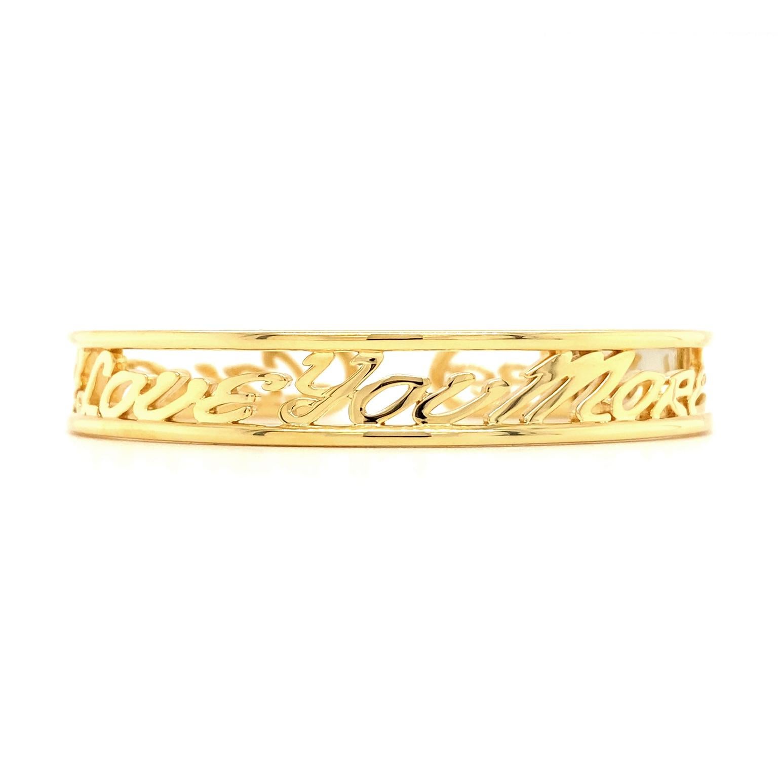 Love and stars embellish this bracelet. The body is 18k yellow gold, with smooth lines forming the edges. Inside, the phrase 'I love you more' serves as affirmation and adornment. Stars brightened with round brilliant cut diamonds punctuate the