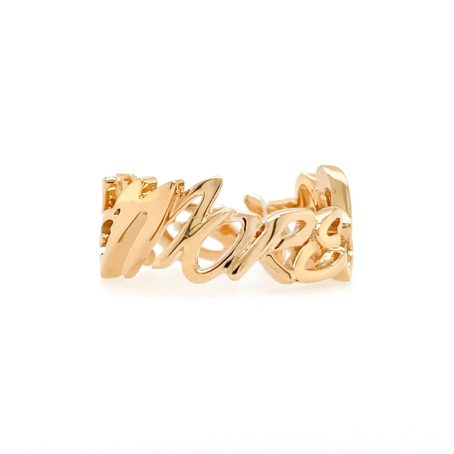 A hint of blush accents this ring. To give gold durability and a touch of color, it was alloyed with copper, creating 18k rose gold. The precious metal is formed into semi-cursive 8mm high block letters saying 'I love me more.' Rather than me