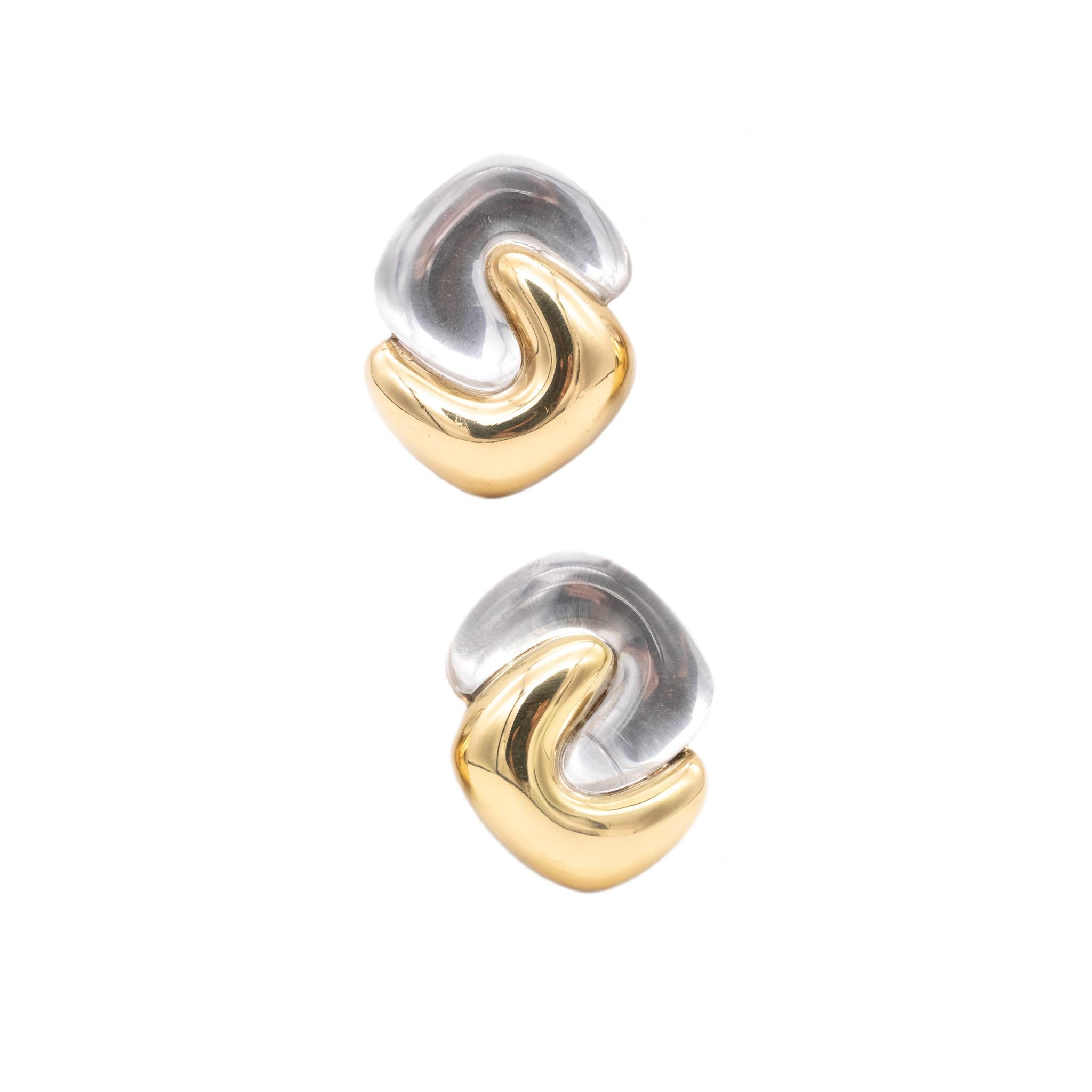 Beautiful pair of earrings designed by Valentin Magro.

A modern sculptural pair, crafted in solid 18 karats of high polished yellow gold. They are conceived as a mirrored pair and suited with posts for pierced ears (removable) and hinged omega
