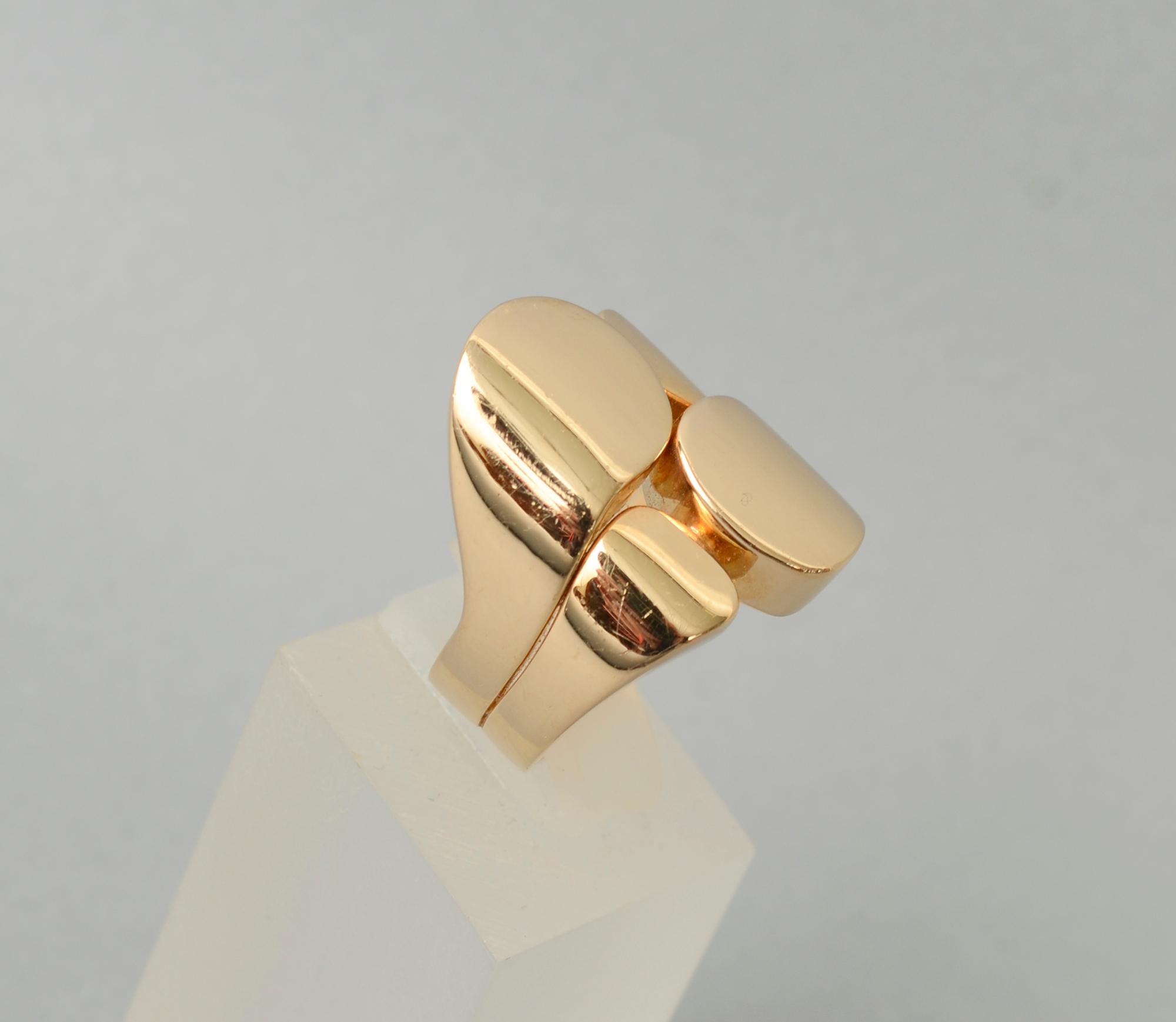 Fabulous modernist design gold ring by Valentin Magro. Although the ring is actually fairly contemporary, it is very much in the modernist style. It is wonderfully bold and would be effective on a man or woman. The ring measures one inch from front