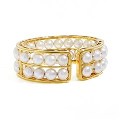 Bracciale galleggiante con due file di perle Akoya in oro giallo 18 carati