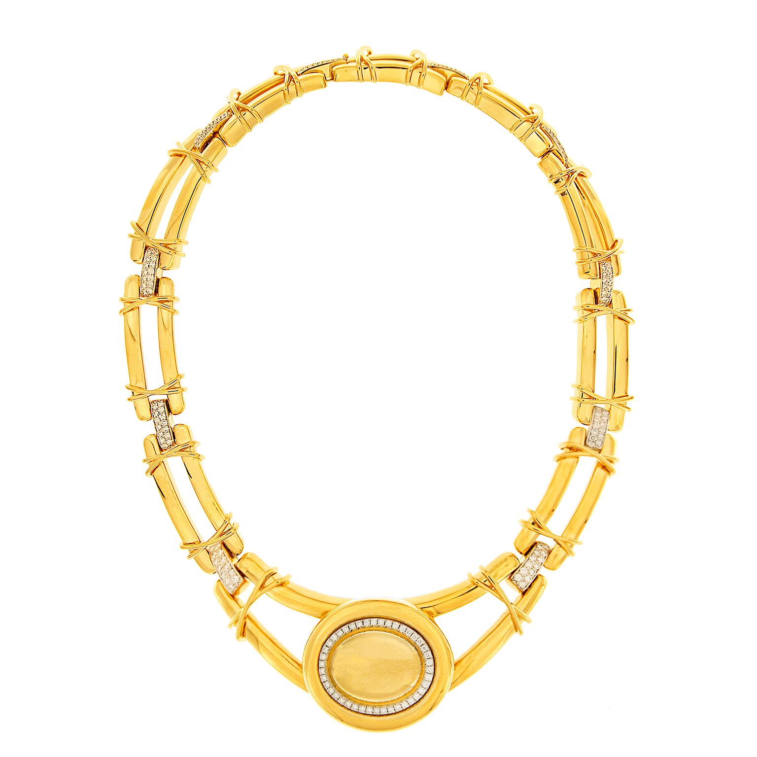 Valentin Magro Removable Turquoise Cabochon 18 Karat Necklace showcases a jewel is carved into an oval cabochon and bezel set.  The other side of the center piece is plain gold with diamonds and the necklace can be worn this way also.  As another