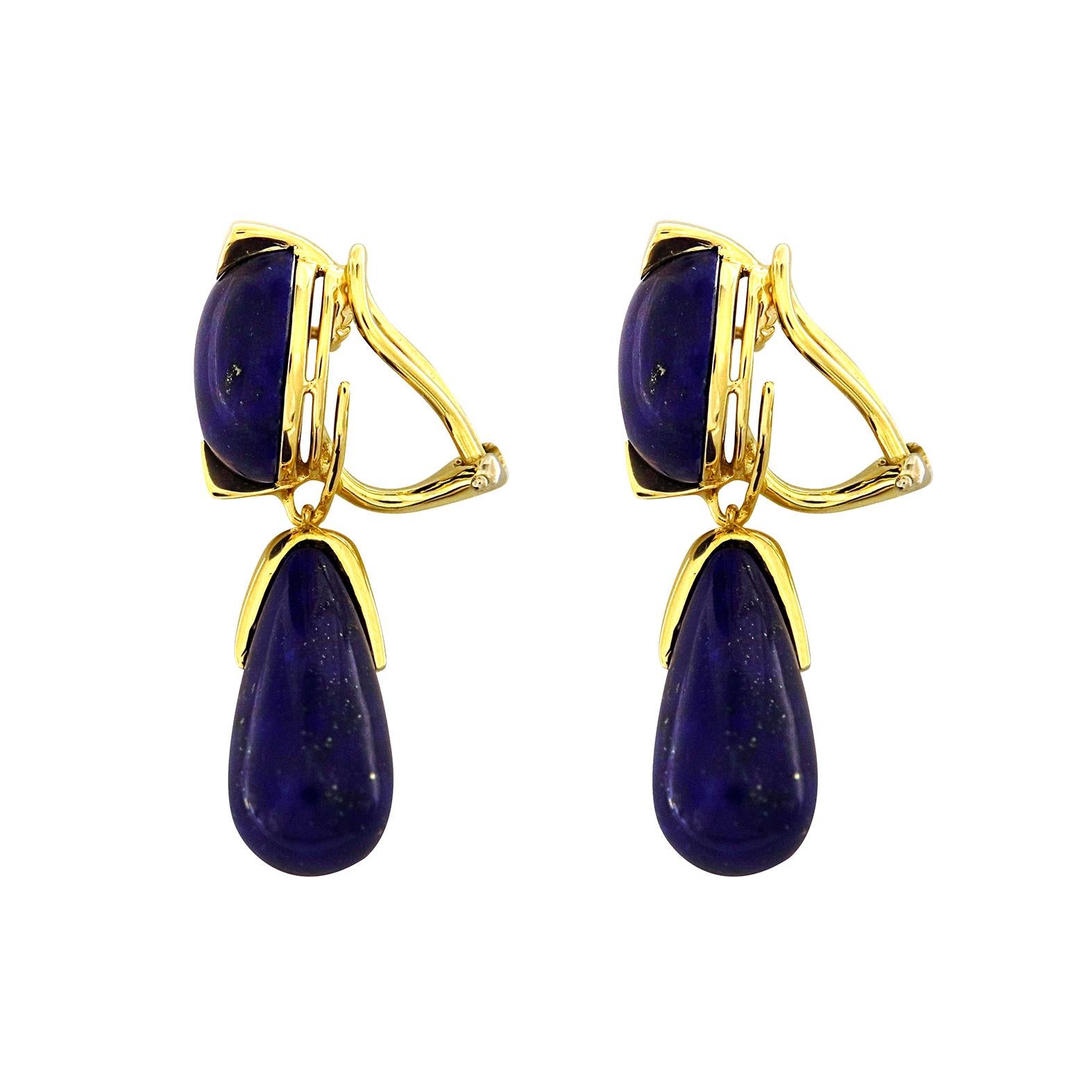Bright gold accents these deep-toned drop earrings. Lapis lazuli is carved into round cabochons and pear drops, showcasing their dark azures. A closer look reveals bits of pyrite interspersed throughout the jewels. Prongs and caps of 18k yellow gold