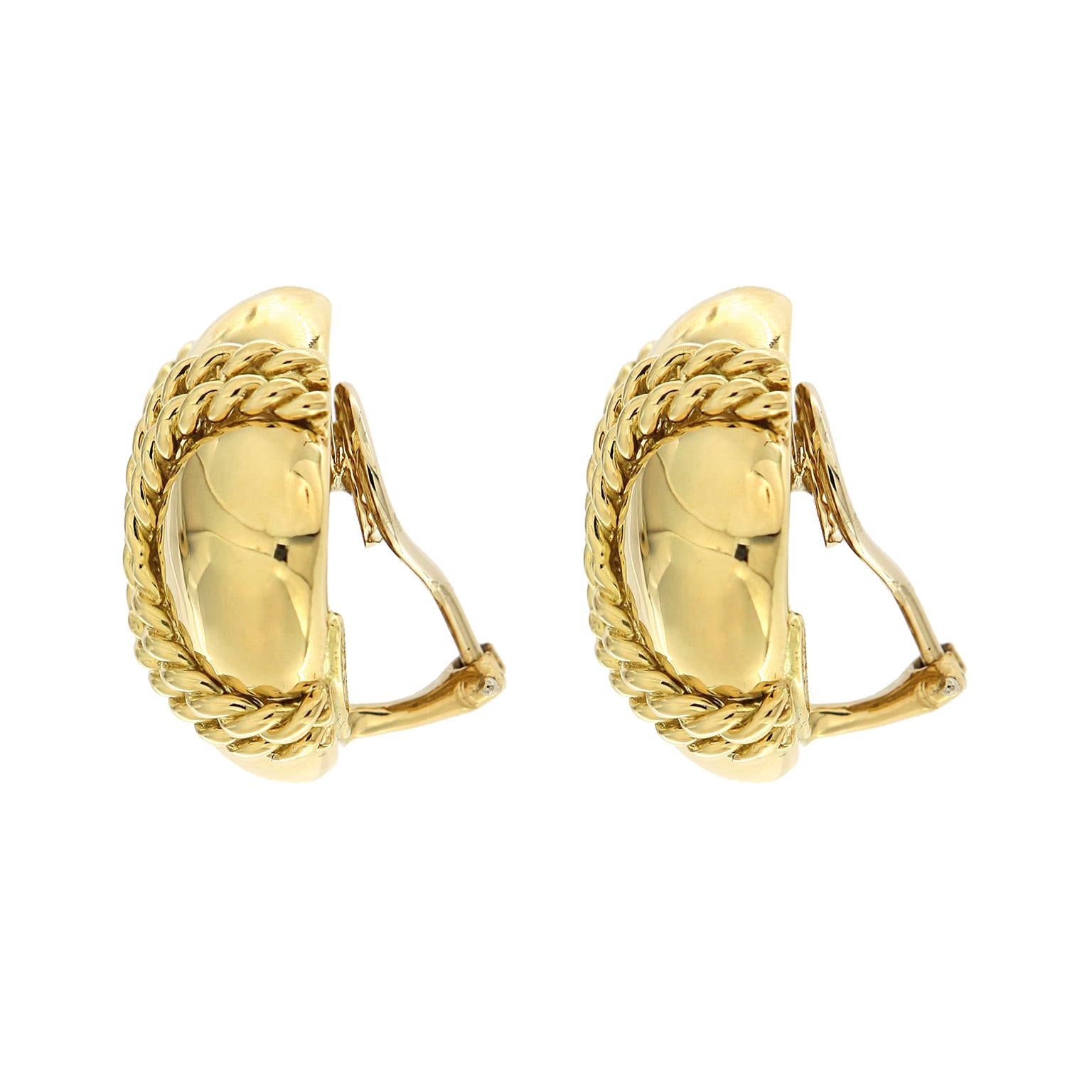 These diamond-shaped earrings created by Valentin Magro are all gold. The base is smooth polished 18k yellow gold. Double rows of twisted gold rope crisscross the fronts. Clip backs keep the earrings secure. 

Measurement detail - width 0.98 inches