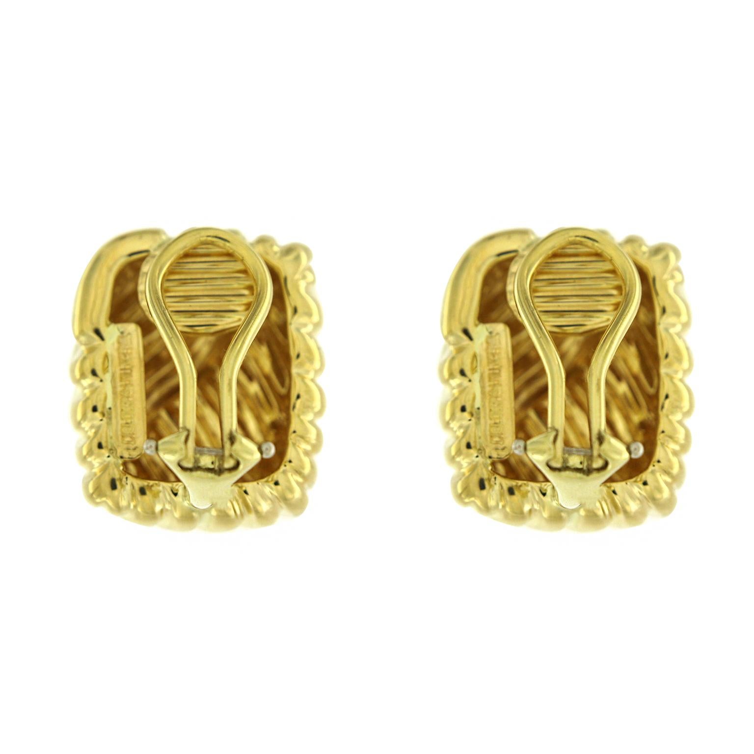 Valentin Magro 18 Karat Yellow Gold Square Wave Earrings seem to dance. Each earring features two right triangles joined to form a square. The two halves groove in different directions, adding variety to the design. Their gold shines bright,