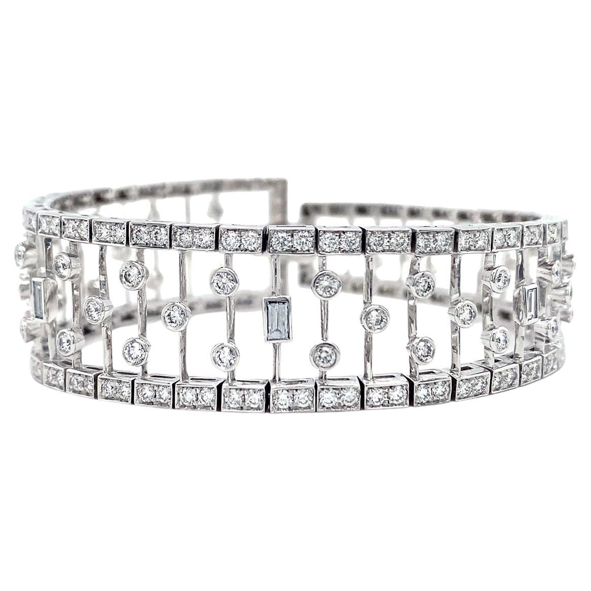 Tapered Baguette and Round Diamond Platinum Bracelet For Sale