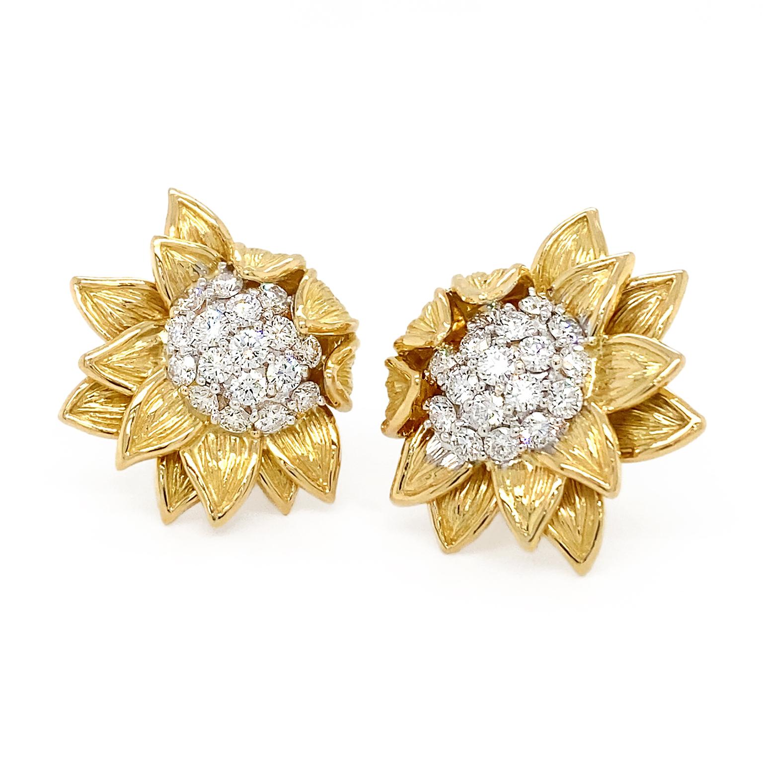 Bloomed sunflowers are illustrated by gold and diamonds. 18k yellow gold textured petals overlap and fold over each other, as they would in real life. A total of 34 round brilliant cut diamonds dance with light in the center. The total weight is