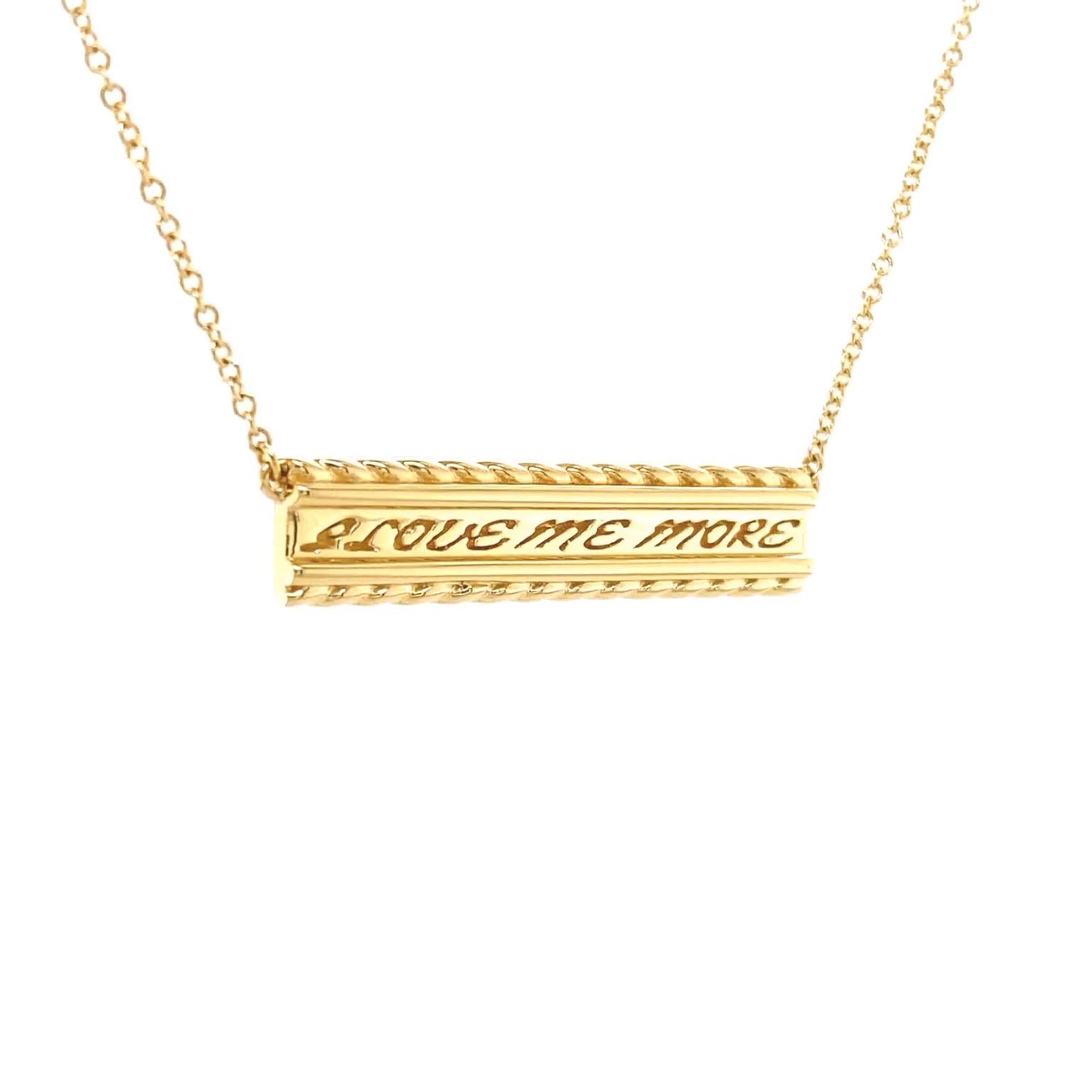 Valentin Magro Yellow Gold I Love Me More Bar Pendant carries a gleaming message. The body is 18k yellow gold shaped into an elongated bar. Twisted wires placed widthwise bring texture to the design. Between them stretch the words 'I love me more'
