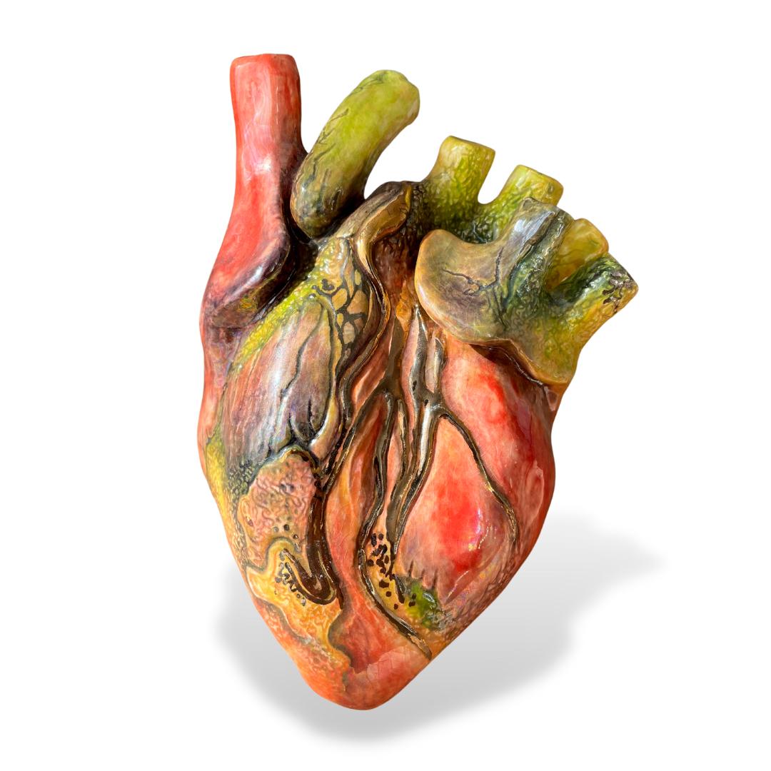 This sculpture represents the cicle of life. The cicle of a dying heart, from the first sympthom to death.

This sculpture was created modeled by hand and painted in layers. The heart went at least 5 times to the ceramic kiln for a saturated color