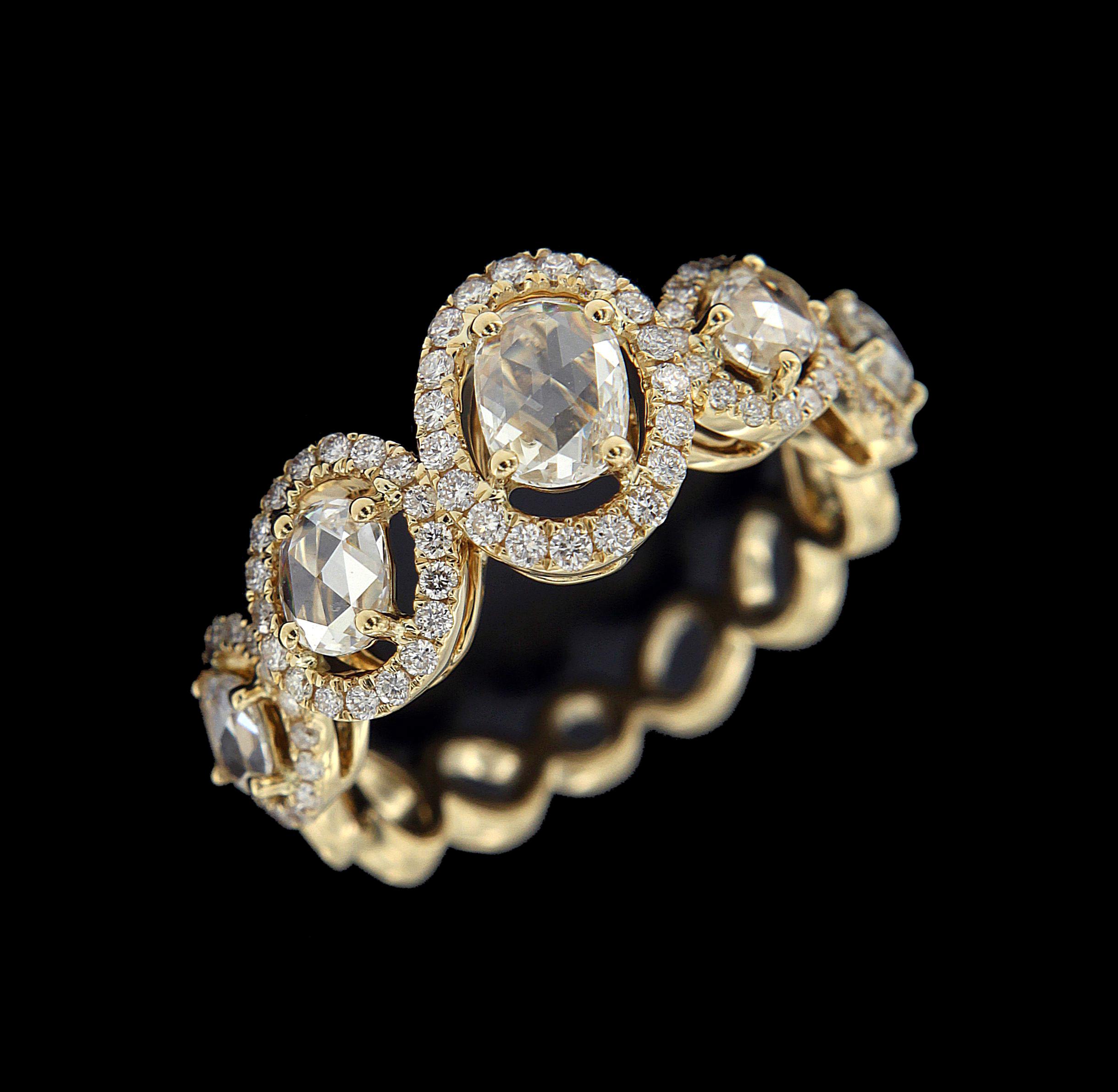 Valentine's Day: Elegant 18 Karat Yellow Gold And Brown Rose Cut Diamond Ring 
Ring 
Brown rose cut Diamonds weighing approximately around 1.261 carats , mounted on 18 karat yellow gold  . The ring weighs around 5.068  grams approximately. 

Please