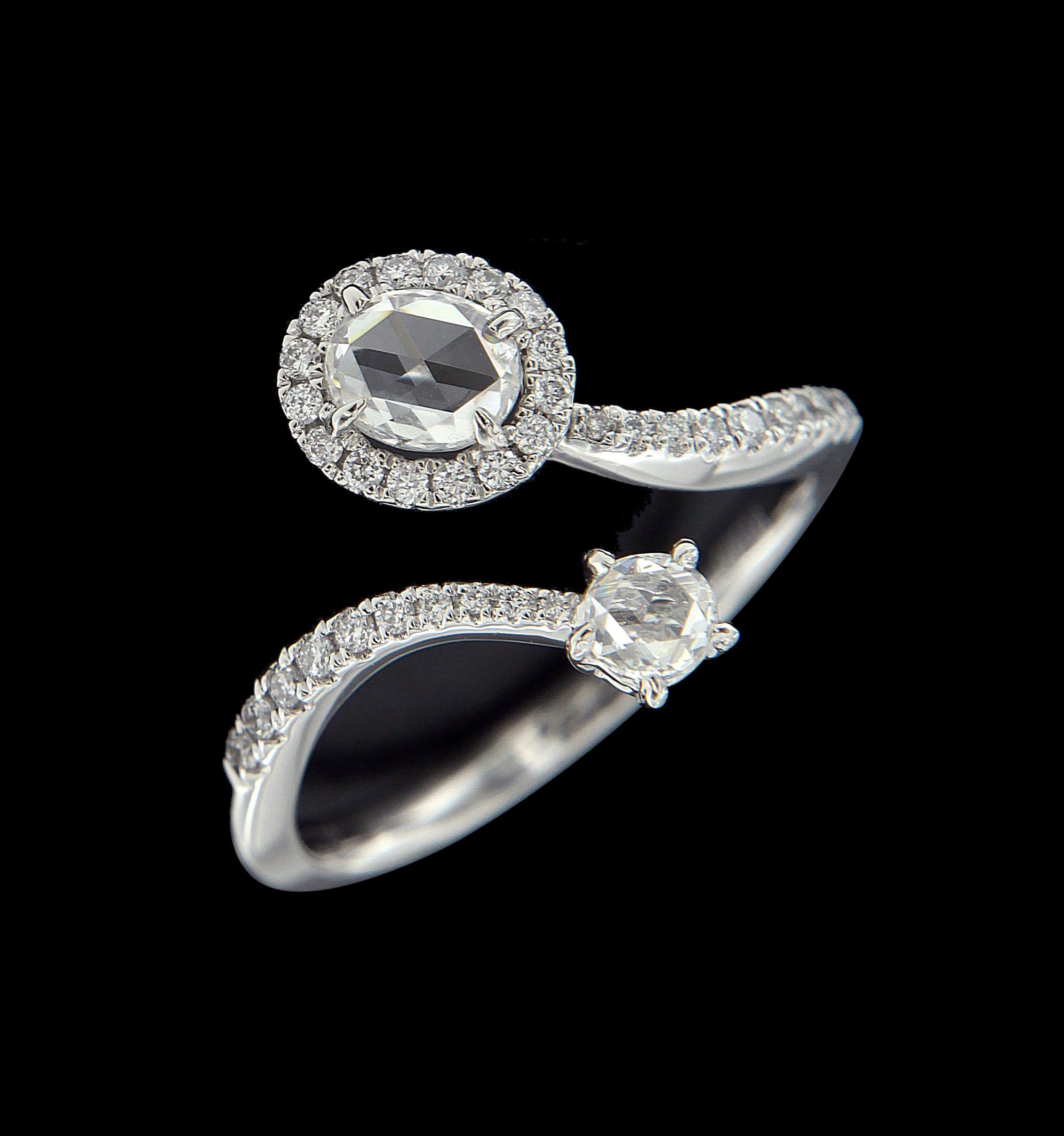 Gorgeous 18 Karat White Gold And  Diamond Ring 
Ring 
Diamonds weighing approximately around 0.657 carats , mounted on 18 karat White gold ring. The ring weighs around 3.789 grams approximately. 

Please note: The prices listed do not include any