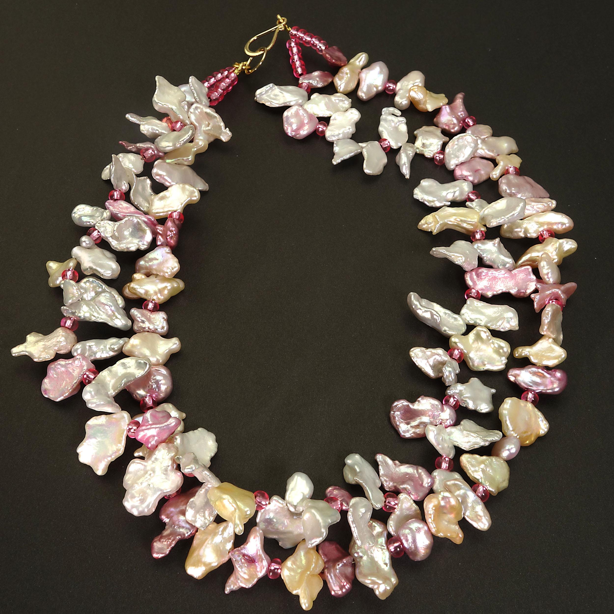 
'Pearls are always appropriate'   Jackie Kennedy

Unique two strand necklace of dyed freshwater Pearls in pink and white with pink Czech bead accents.  This lovely necklace sits just at 16 inches and can be given a gentle twist or two to shorten to