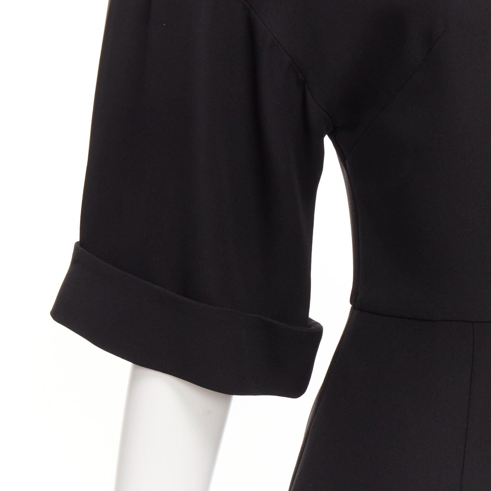 VALENTINO 100% silk black bell half sleeve wide leg crew neck playsuit IT38 XS
Reference: LNKO/A02339
Brand: Valentino
Designer: Pier Paolo Piccioli
Material: Silk
Color: Black
Pattern: Solid
Closure: Zip
Lining: Black Fabric
Extra Details: Back