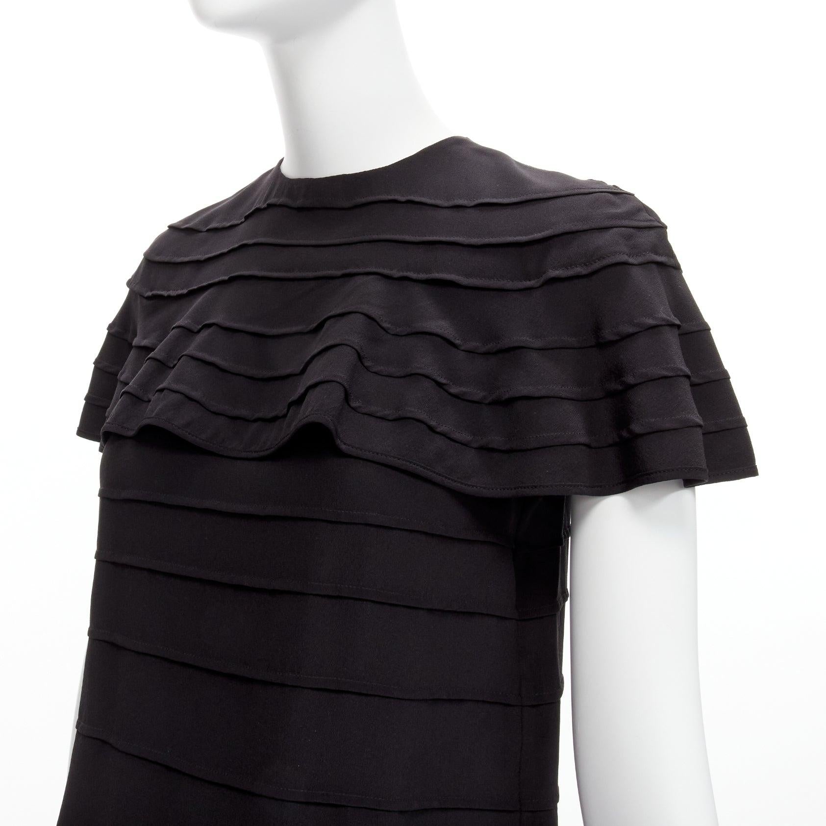 VALENTINO 100% silk black crepe cape sleeves tiered French seam blouse IT38 XS
Reference: LNKO/A02172
Brand: Valentino
Designer: Pier Paolo Piccioli
Material: Silk
Color: Black
Pattern: Solid
Closure: Zip
Extra Details: Back zip.
Made in: