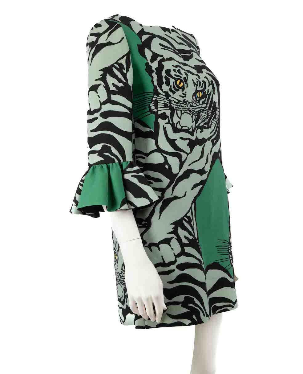 CONDITION is Very good. Minimal wear to dress is evident. Minimal wear to the brand label at the lining with two corners having become detached on this used Valentino designer resale item.
 
 Details
 1967 Re-Edition
 Green
 Wool
 Dress
 Tiger