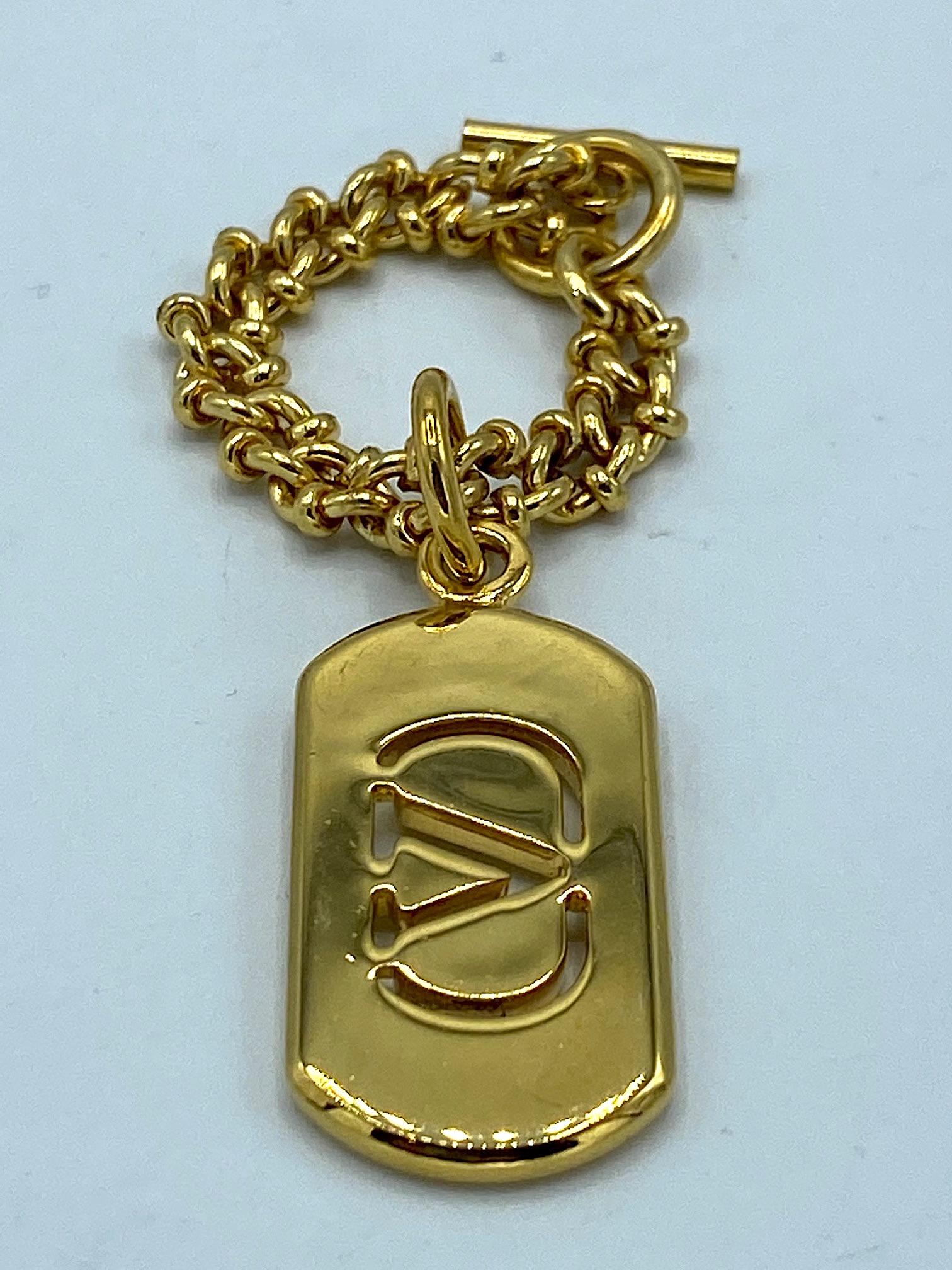 Women's or Men's Valentino 1980 / 1990s Gold Chain Logo Key Ring with Tag For Sale