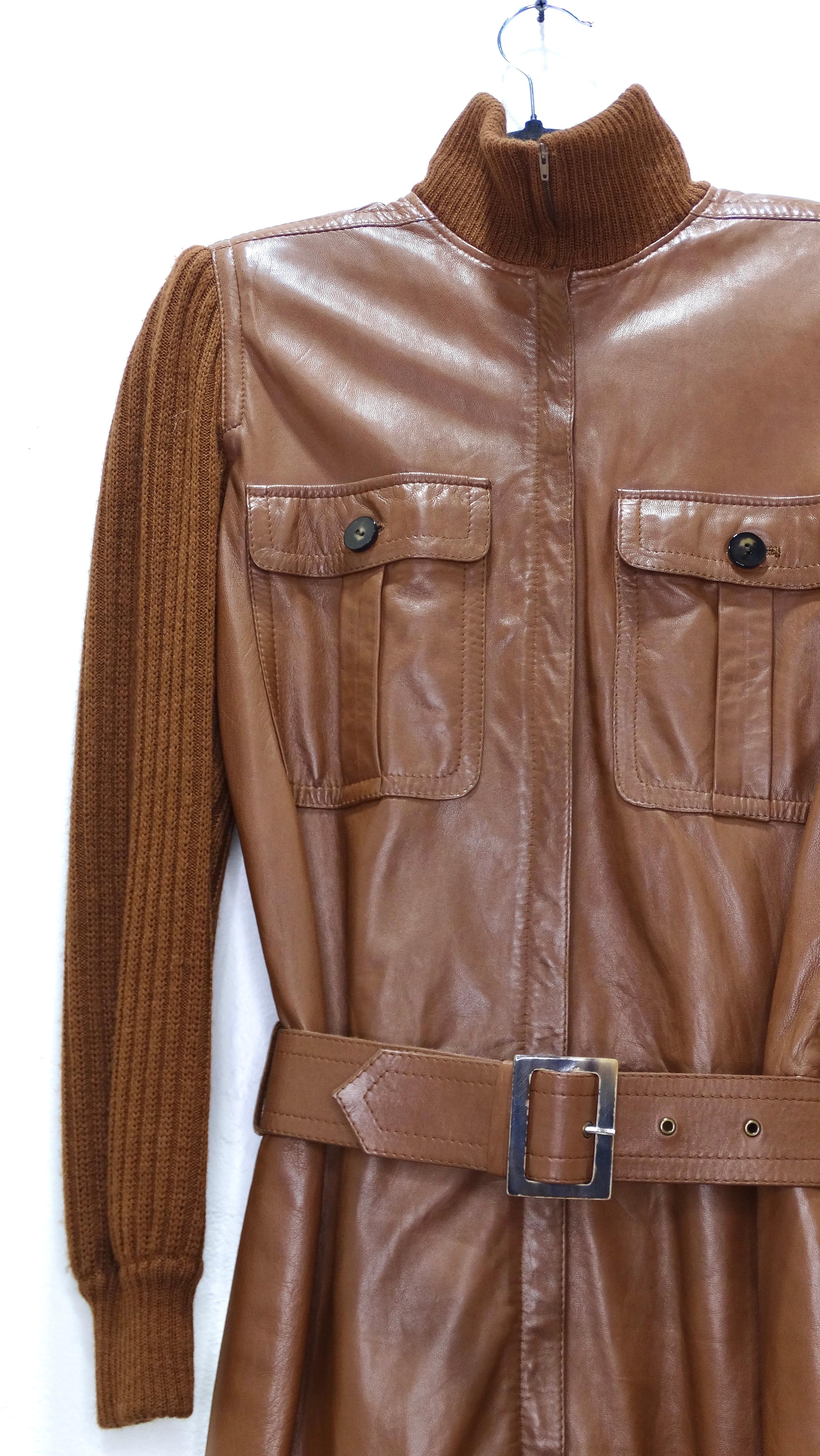 Get your hands on this vintage 1980's Valentino gem. This has a beautifully soft camel colored leather with a knit arms and collar. It has a full zip on the center that could be worn open as a jacket or zipped as a dress. It has a beautiful belt
