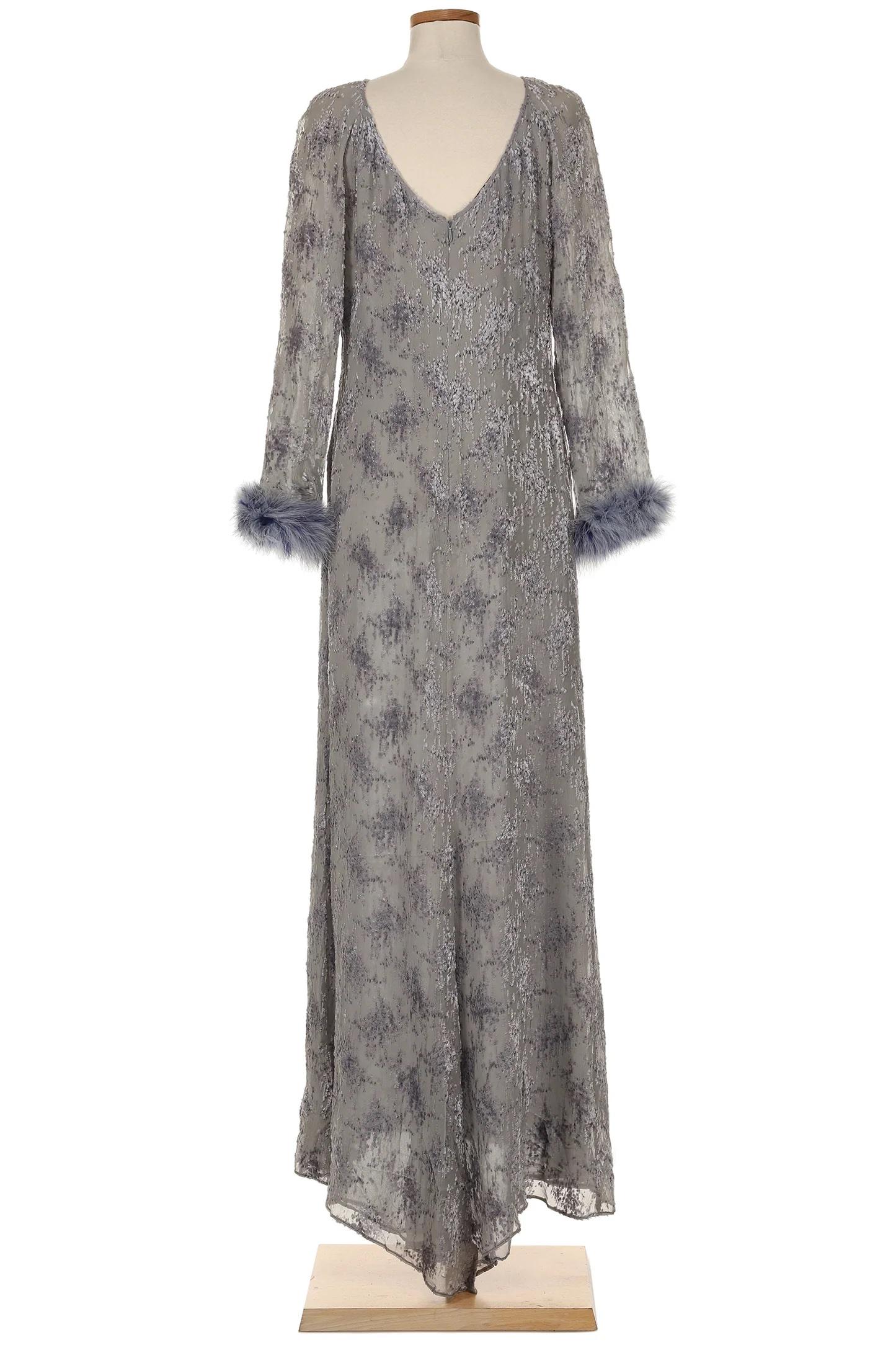 VINTAGE GRACE NY

Step into a world of timeless elegance with this exquisite vintage Valentino gown from the 1990s. Crafted with meticulous attention to detail, this floor-length dress showcases the brand’s signature blend of sophistication and