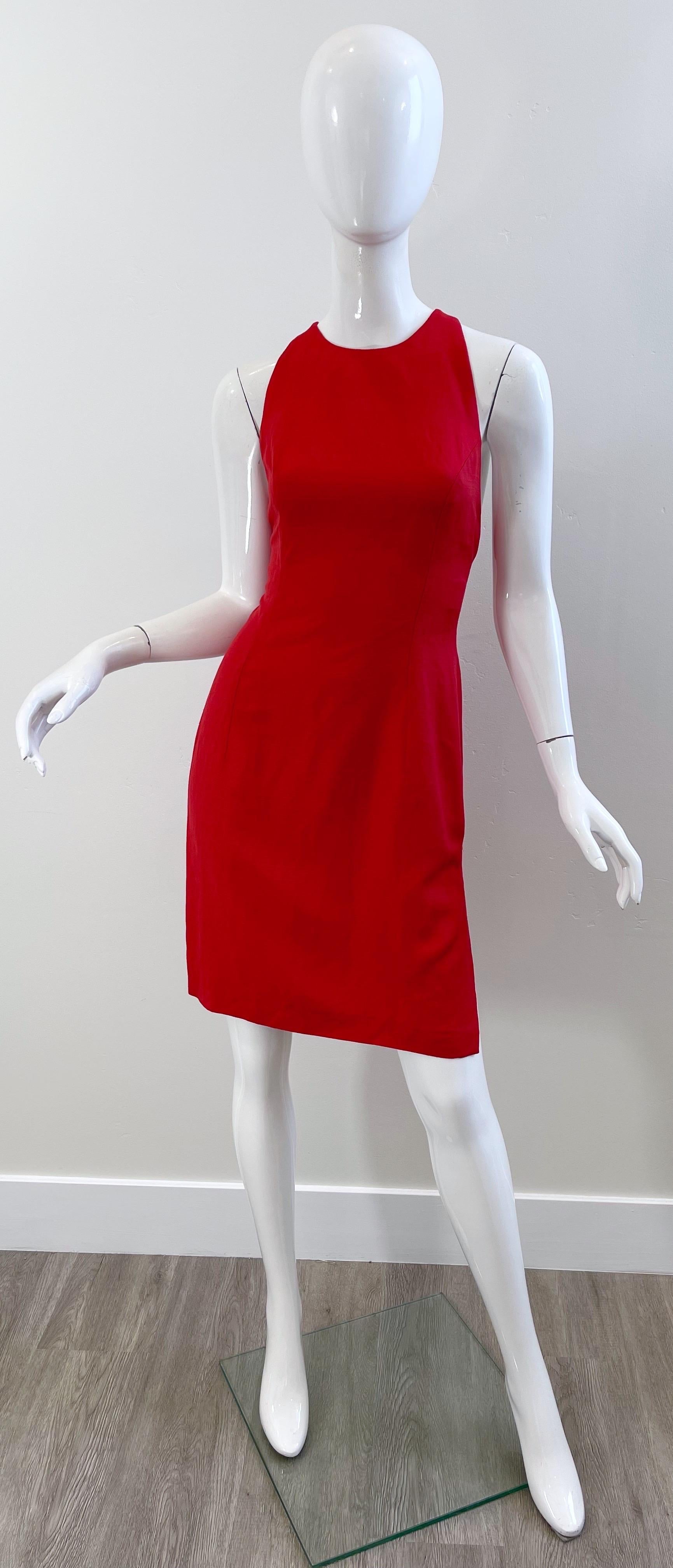 Chic mid 90s VALENTINO ‘ Miss V ‘ signature lipstick red halter cross-cross Rayon ( 90% ) and Linen ( 10%) dress ! Features a halter neckline for support that criss crosses in the back with two gold buttons. Hidden zipper up the back with