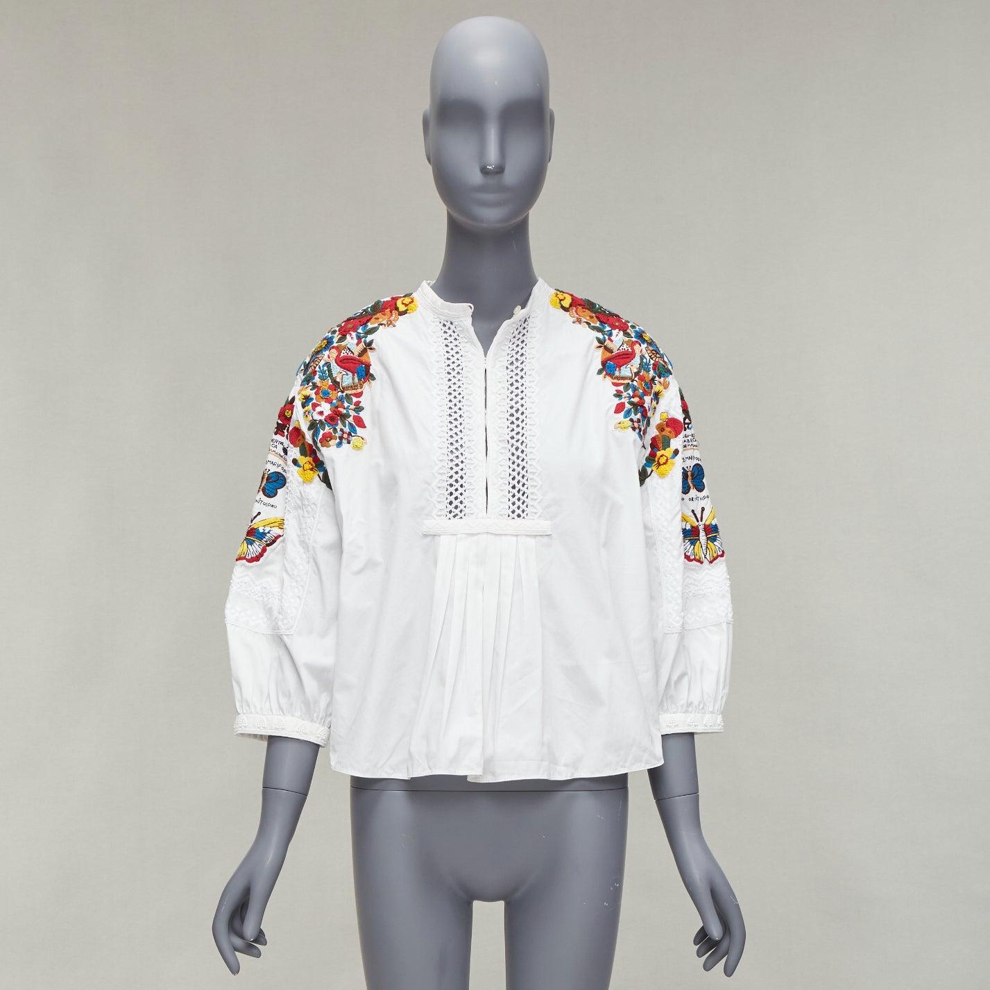 VALENTINO 2017 Pasarela blanco mariposa especies bordado boho blusa  IT38 XS
Referencia: NILI/A00027
Marca Valentino
Diseñador: Pier Paolo Piccioli
Colección: 2017 Resort - Pasarela
Material: Algodón
Color: Blanco, Multicolor
Patrón: Sólido
Cierre: