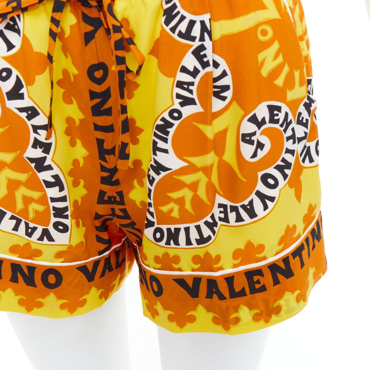 VALENTINO 2022 100% silk crepe yellow bandana print wide shorts IT36 XXS
Reference: AAWC/A01319
Brand: Valentino
Designer: Pier Paolo Piccioli
Collection: 2022
Material: Silk
Color: Yellow, Multicolour
Pattern: Abstract
Closure: Drawstring
Lining: