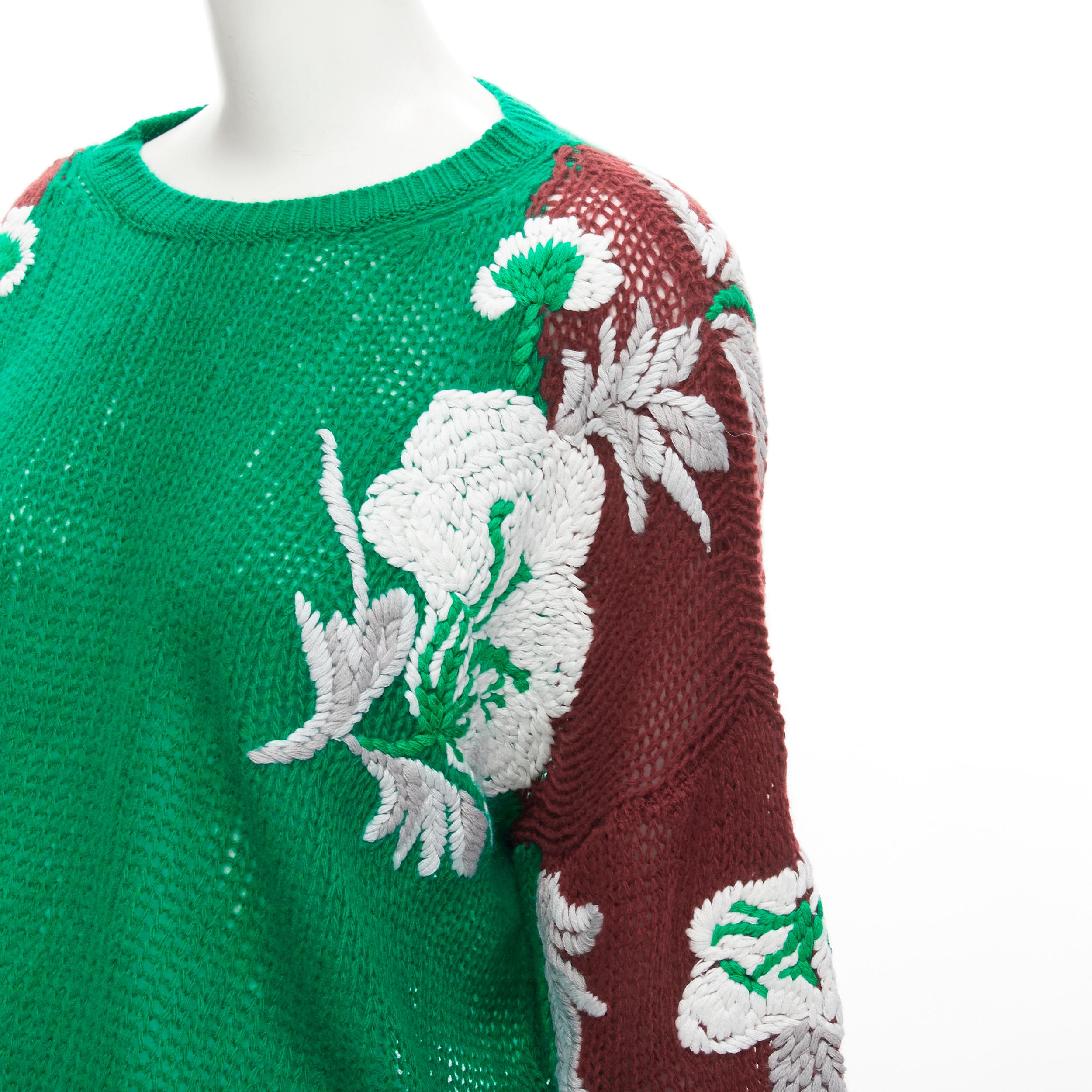 VALENTINO 2022 100% virgin wool green white floral embroidery sleeves sweater S
Brand: Valentino
Material: Virgin Wool
Color: Green
Pattern: Floral
Made in: Italy

CONDITION:
Condition: Excellent, this item was pre-owned and is in excellent