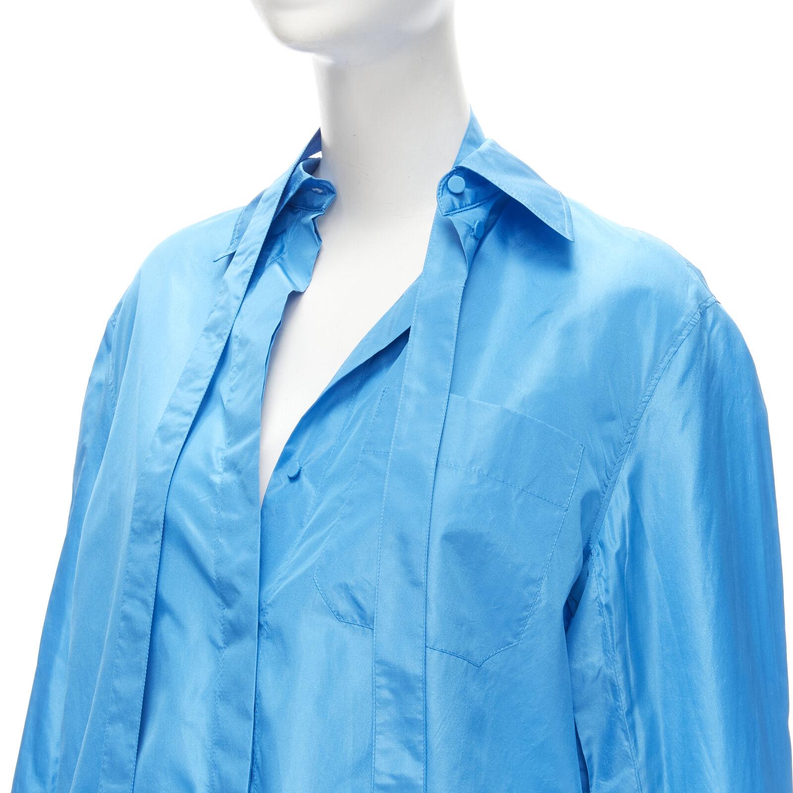 VALENTINO 2022 Runway blue silk tafetta relaxed neck tie oversized shirt IT38 XS
Reference: AAWC/A00266
Brand: Valentino
Designer: Pier Paolo Piccioli
Collection: 2022 - Runway
Material: 100% Silk
Color: Blue
Pattern: Solid
Closure: Button
Made in: