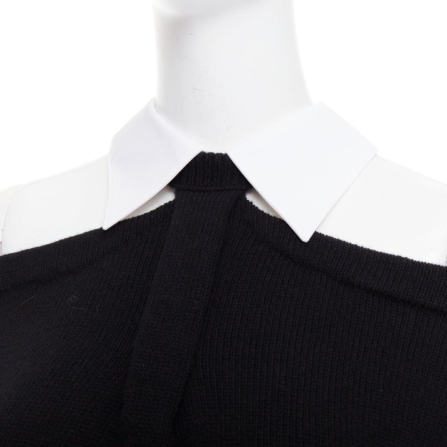 VALENTINO 2023 black 100% virgin wool collar cold shoulder sweater XS
Reference: AAWC/A01416
Brand: Valentino
Designer: Pier Paolo Piccioli
Model: 232476F109003
Collection: 2023
Material: Virgin Wool
Color: Black, White
Pattern: Solid
Closure: