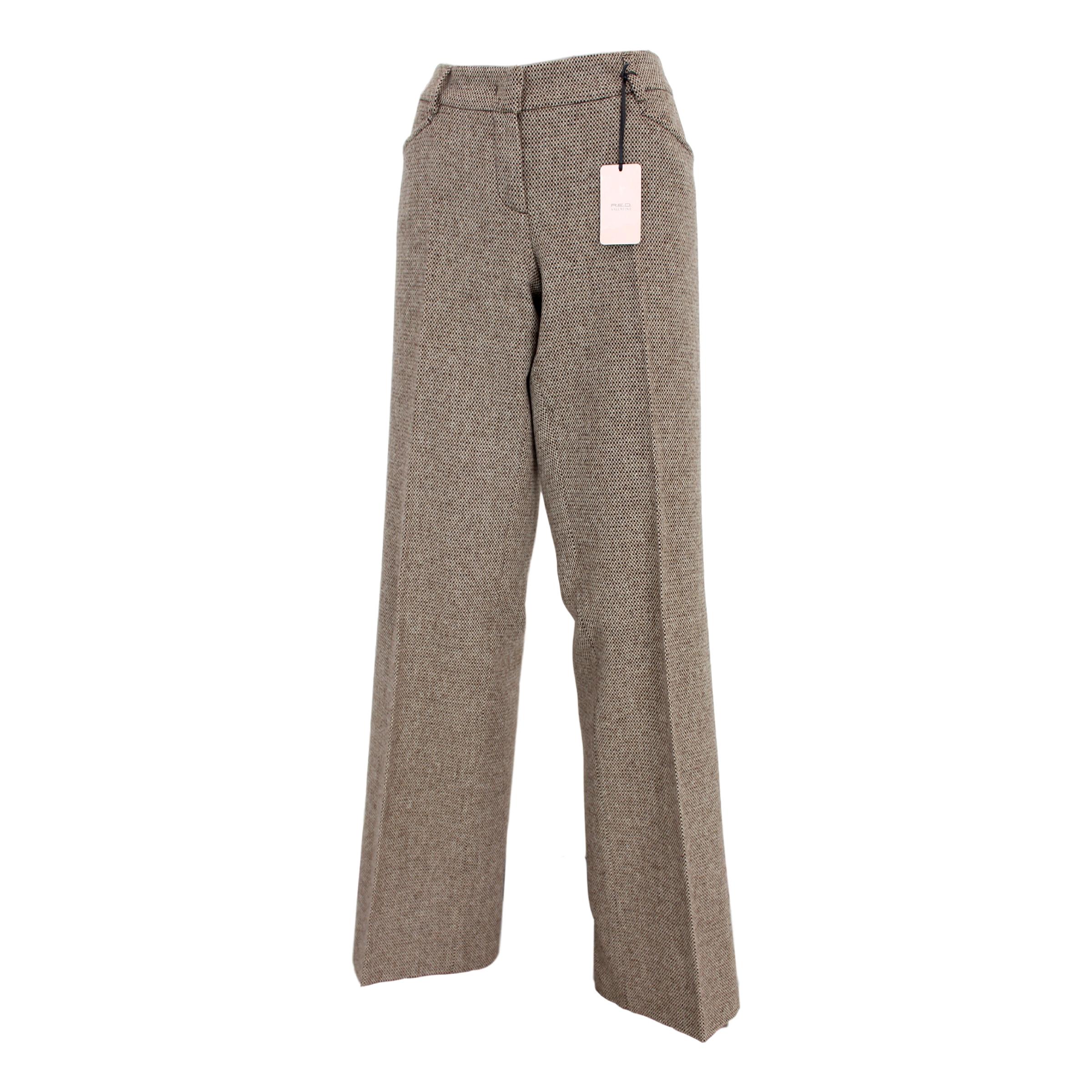 Red Valentino 90s vintage women's trousers. Wide palace pattern, beige and brown, 100% virgin wool. Made in Italy. New with tag.

Size: 48 It 14 Us 16 Uk

Waist trousers: 45 cm
Length: 111 cm
Hem: 27 cm