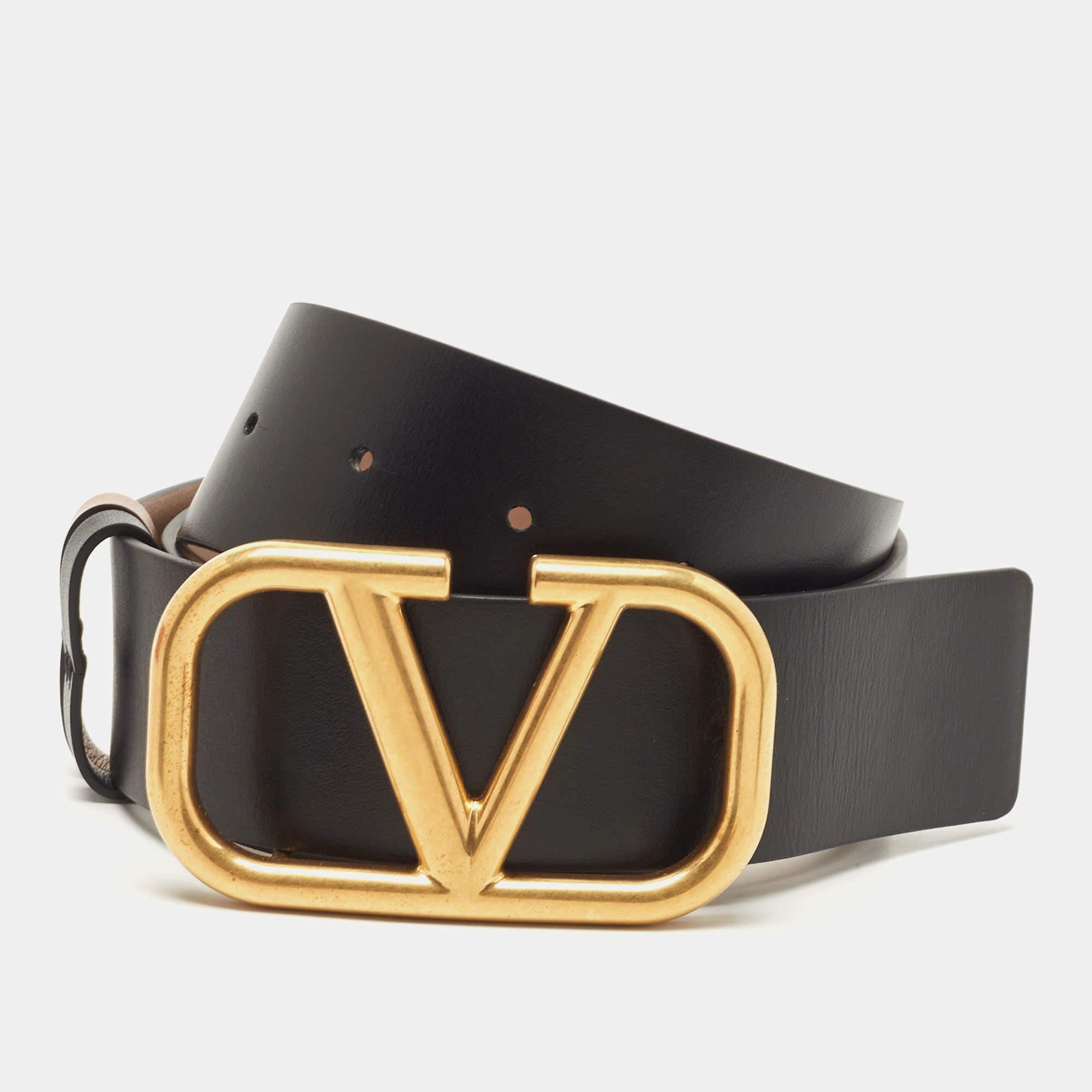 The Valentino belt is a luxurious and versatile accessory. Crafted from high-quality leather, it features a beige side with the iconic VLogo buckle in black, while the reverse side showcases a sleek all-black design. Perfect for adding a touch of