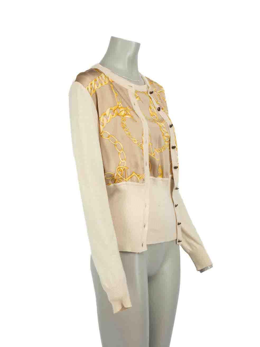 CONDITION is Good. Minor wear to top and cardigan set is evident. Light discoloured marks to silk panels on both the top and cardigan, and mild discoloured marks to wool areas on both pieces as well on this used Valentino designer resale item.
