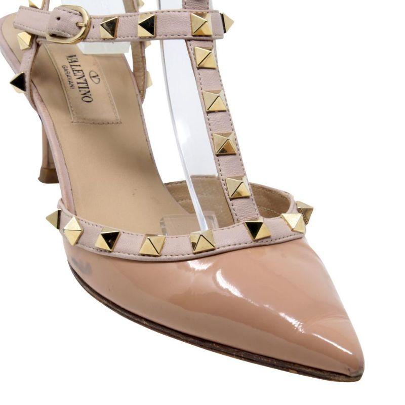 Valentino Beige Garavani Black Studded Leather Heels Pumps

Valentino's iconic pumps are a must have heel for your collection. Known for thier studded look these heels are sure to grab attention. These heels are in good condition with plenty of life