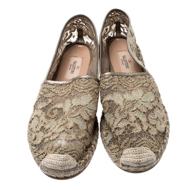 These Valentino espadrilles are light and designed with a lace body and leather trims. Braided details on the toes and espadrille midsoles finish the flats. The beige pair will lend a comfortable touch to your casuals.

Includes: Original Dustbag

