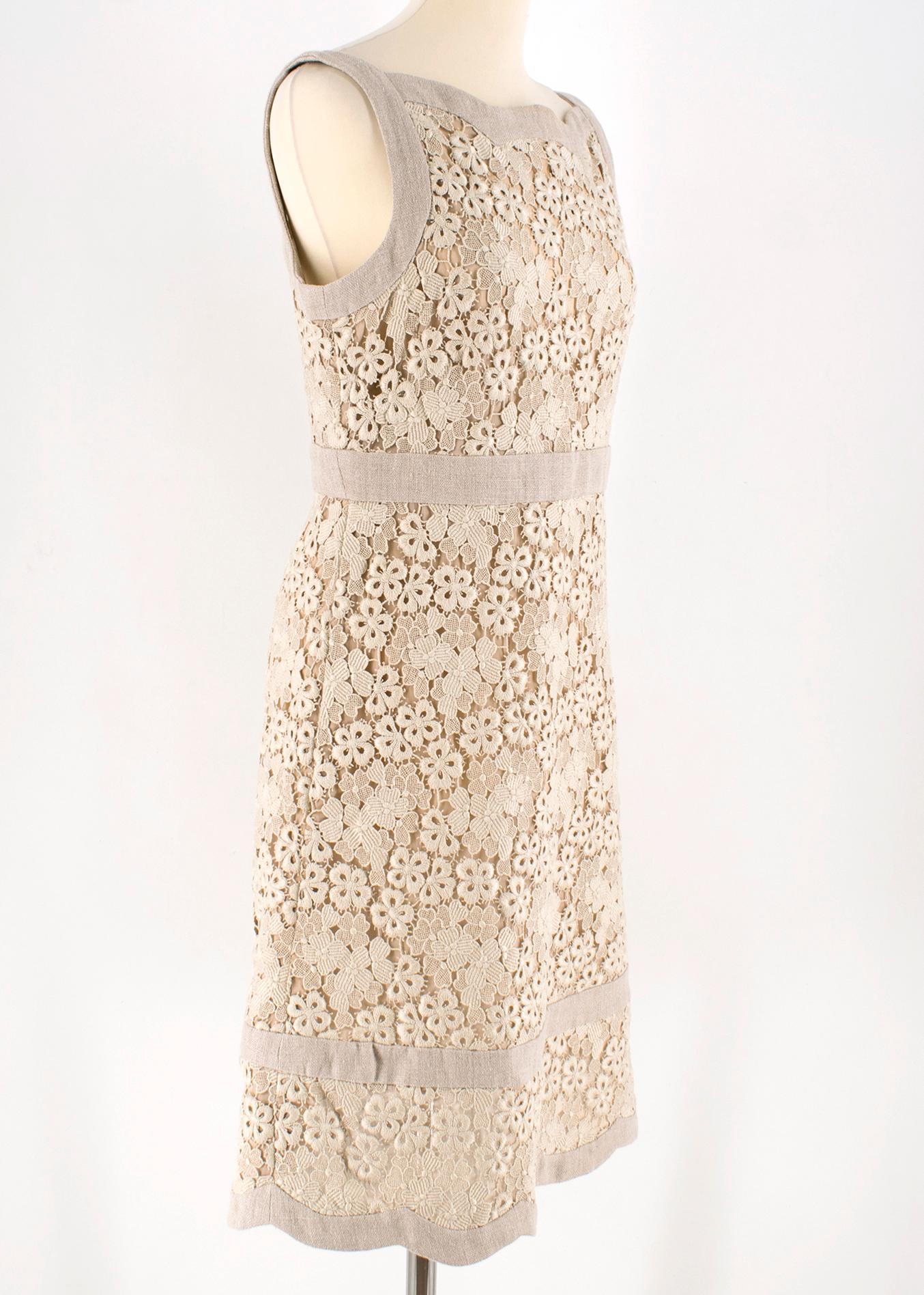 Valentino Beige Linen Lace A-line Midi Dress

- beige linen dress
- a-line silhouette
- sleeveless
- natural fabric lined
- zip closure to the side

Please note, these items are pre-owned and may show some signs of storage, even when unworn and