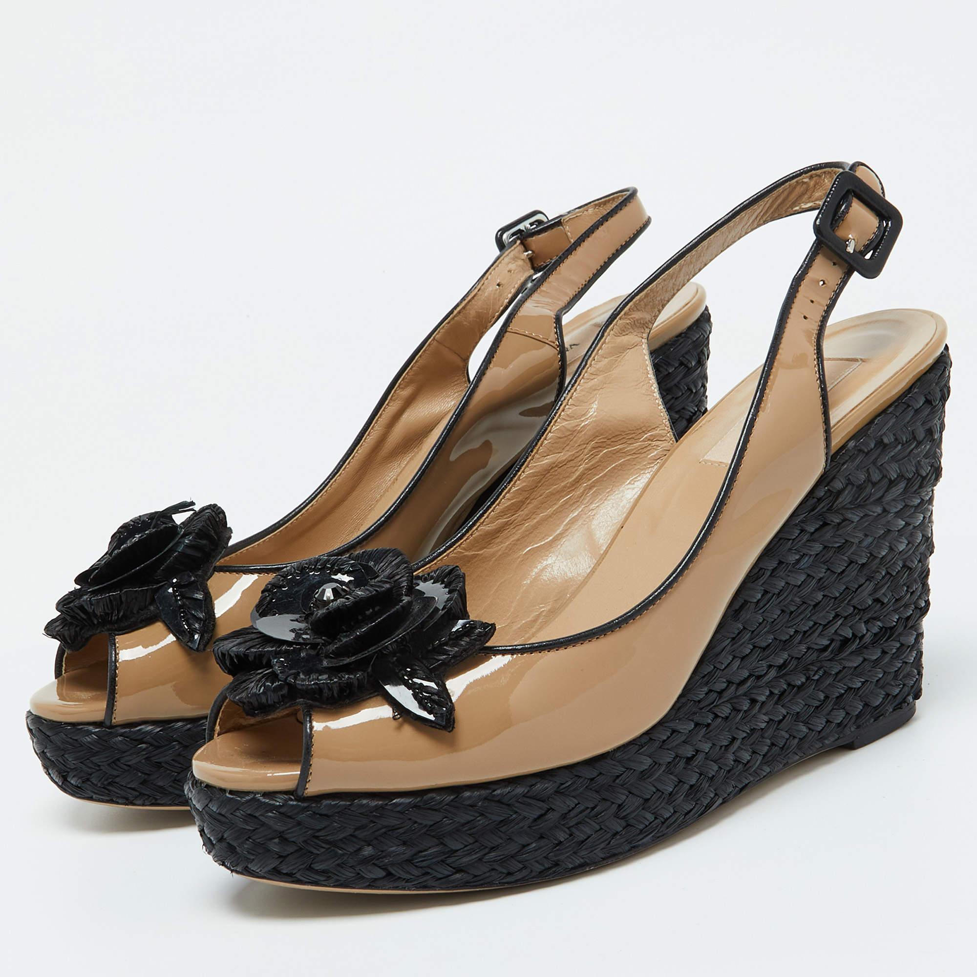 You can count on these Valentino wedge sandals to complete a day to evening look. They are crafted beautifully and designed to offer the right fit and a comfortable lift.