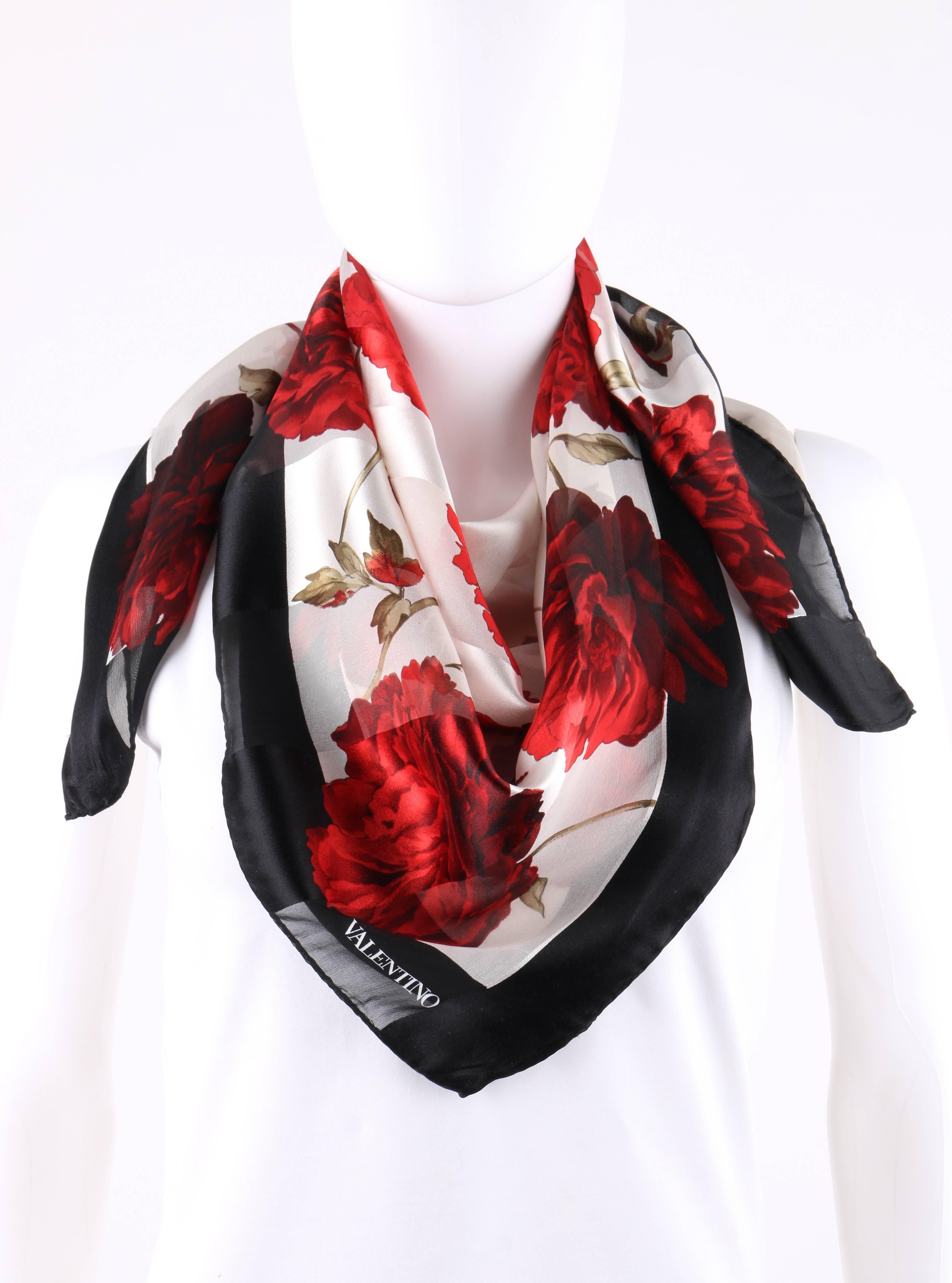Valentino black and white rose floral print striped semi-sheer silk scarf. Black boarder. Winter white center with large red rose print throughout. Alternating stripes of sheer satin. 