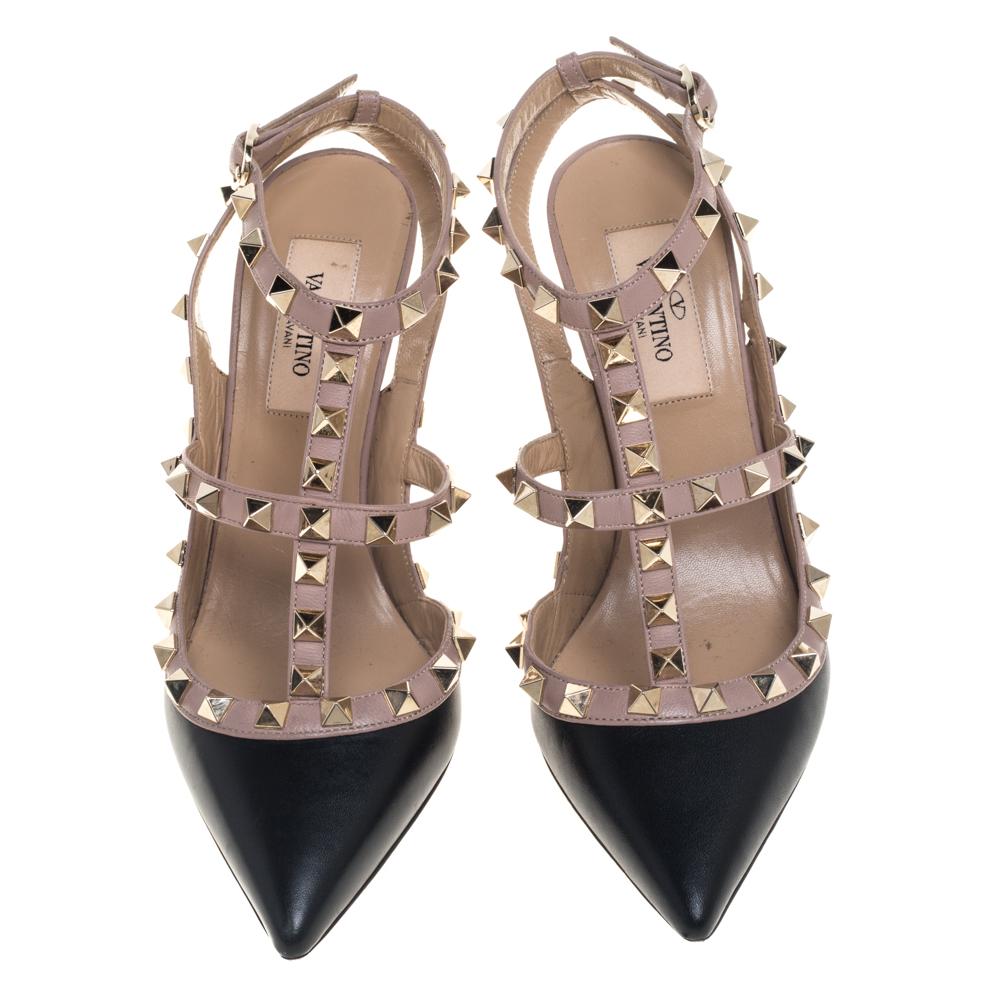 Instantly recognizable, the Rockstud sandals from Valentino are one of the most iconic styles from the brand. These black and beige sandals have been crafted in Italy and made from leather. They have been styled with the signature Rockstud accents