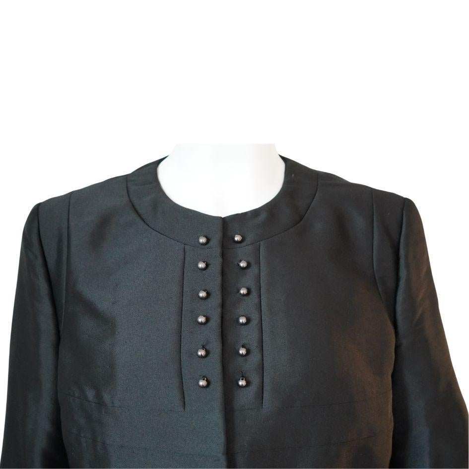 52% Wool, 32% Polyester, 16% Silk
Lining 61% Polyamide, 39% Silk
Made in Italy
Front hook eye closures
Crewneck
Bubble sleeves
Bolero style
Gunmetal faux buttons
Contents tag cut out 
Length 21