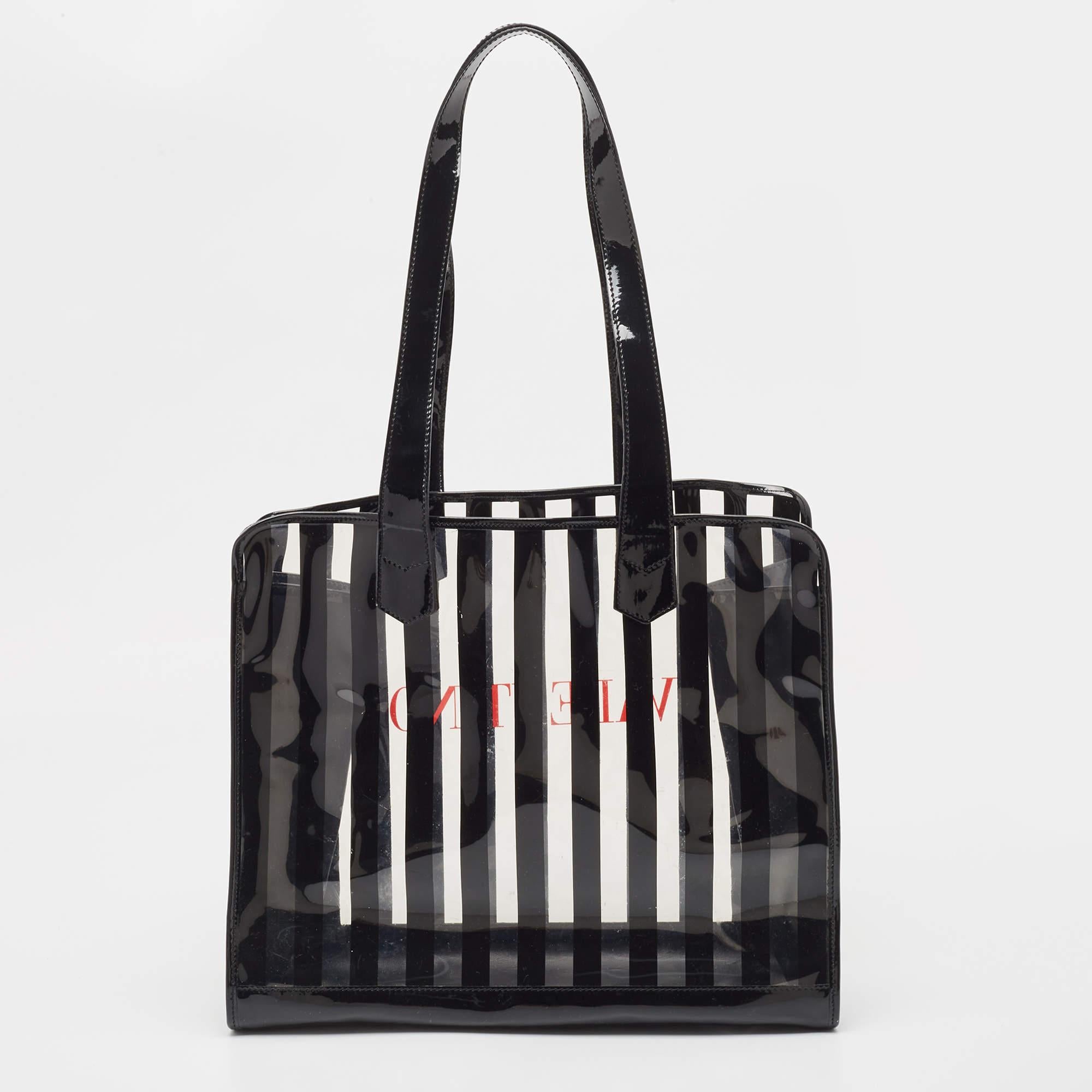 Thoughtful details, high quality, and everyday convenience mark this designer bag for women by Valentino. The bag is sewn with skill to deliver a refined look and an impeccable finish.

Includes: Price Tag