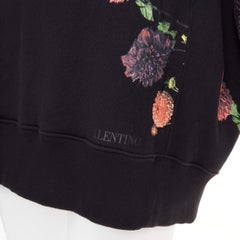 VALENTINO – Oversize-Kapuzenpullover aus schwarzer Baumwolle mit Makro-Rosen-Blumenmuster, Größe M