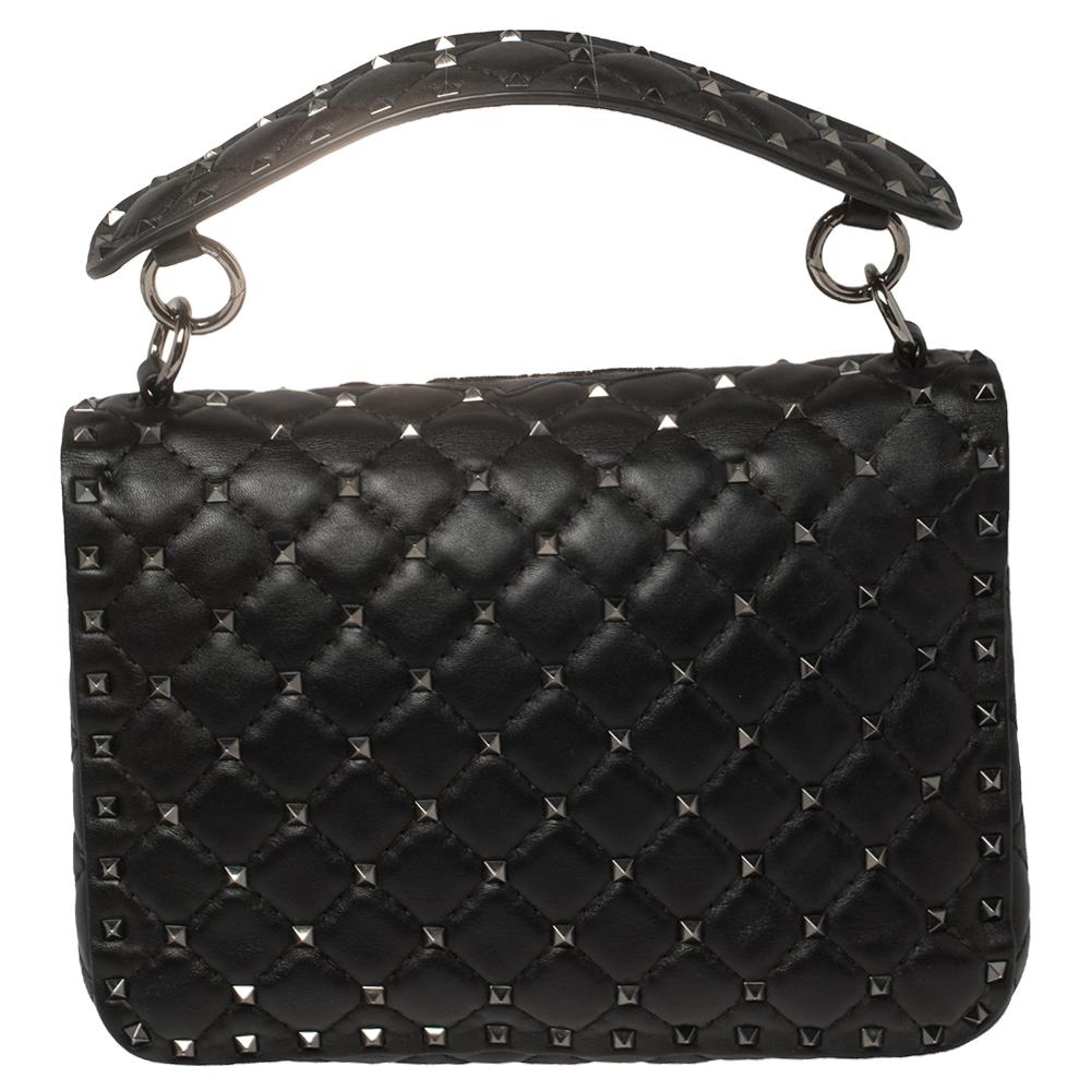 The Valentino Rockstud Spike bag is loved by celebrities and will help you create a statement-making look. It is secured by a twist lock on the flap and punctuated with the label’s signature Rockstuds, each artfully placed on the quilted exterior.