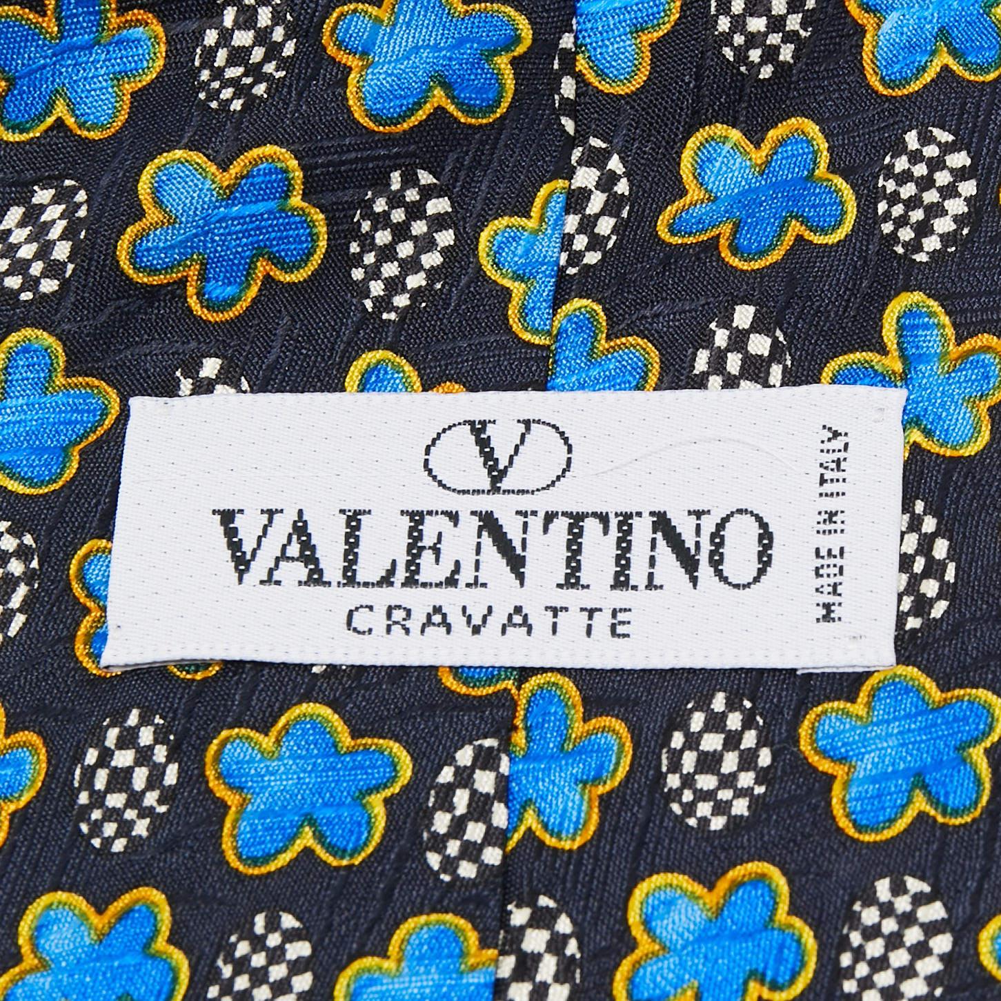 Pick this Valentino tie to give your formal look a touch of luxury. It is cut from silk and detailed with prints all over. It is finished with the brand label on the back.

Includes: Brand Tag, Original Case