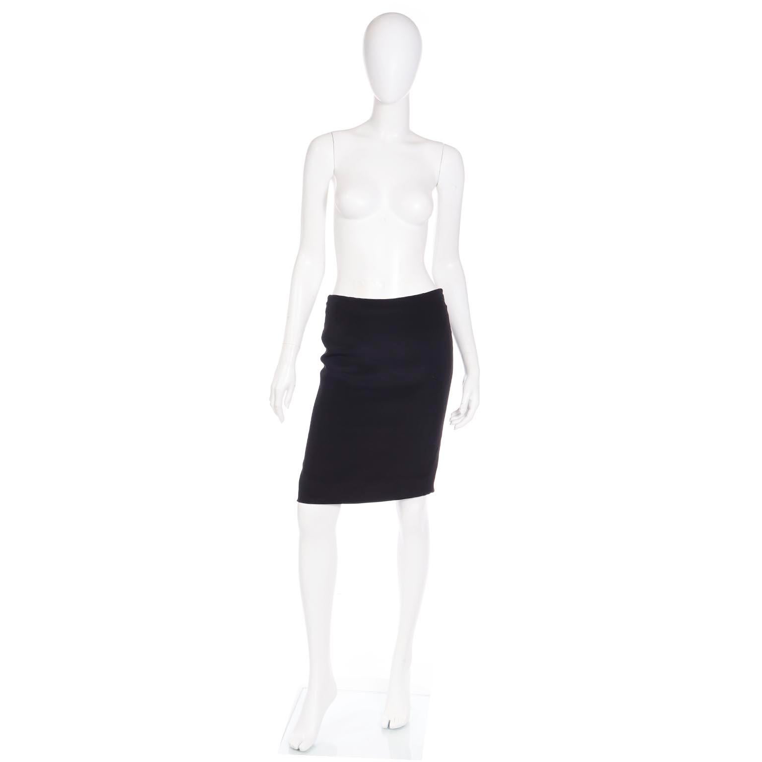 This is a very special early 2000's Valentino black pencil skirt with beautiful gathered ruching in the back that frames a center panel. Valentino Garavani vintage pieces are beautifully made and they always have details that set them apart. This