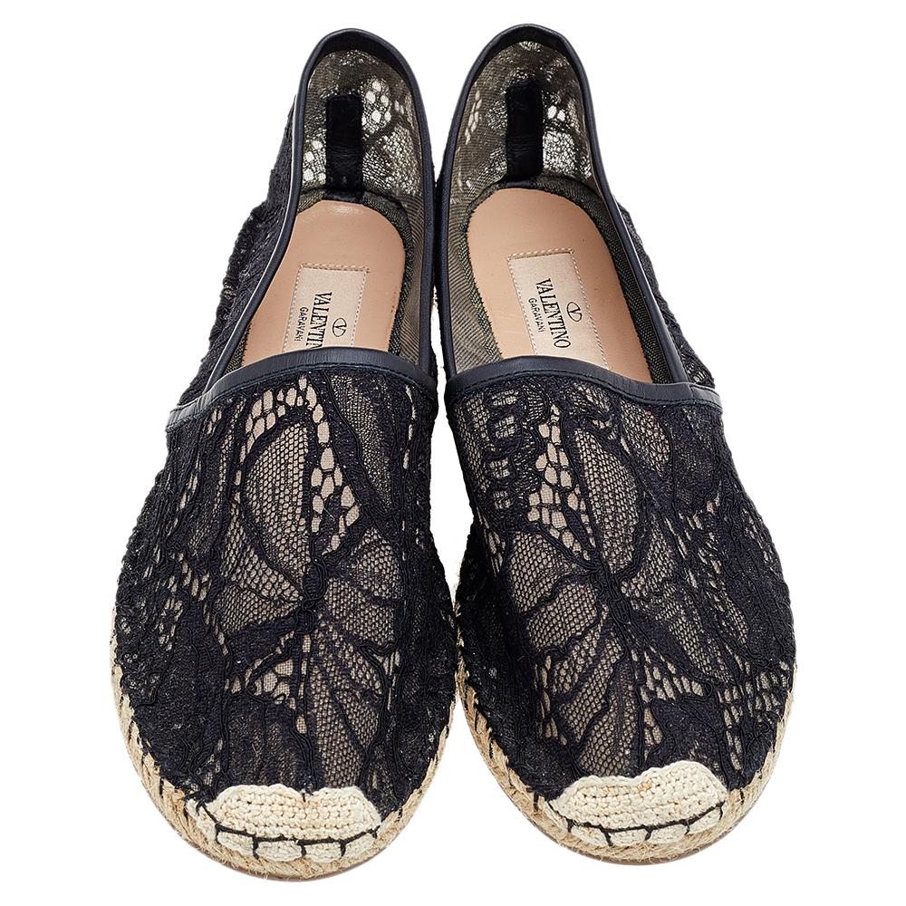 Step out in style every day with these gorgeous espadrilles from Valentino. Featuring a pretty lace exterior, this round-toe pair is completed with braided jute details on the midsoles and knitted details on the cap toes. Slip these on with shorts